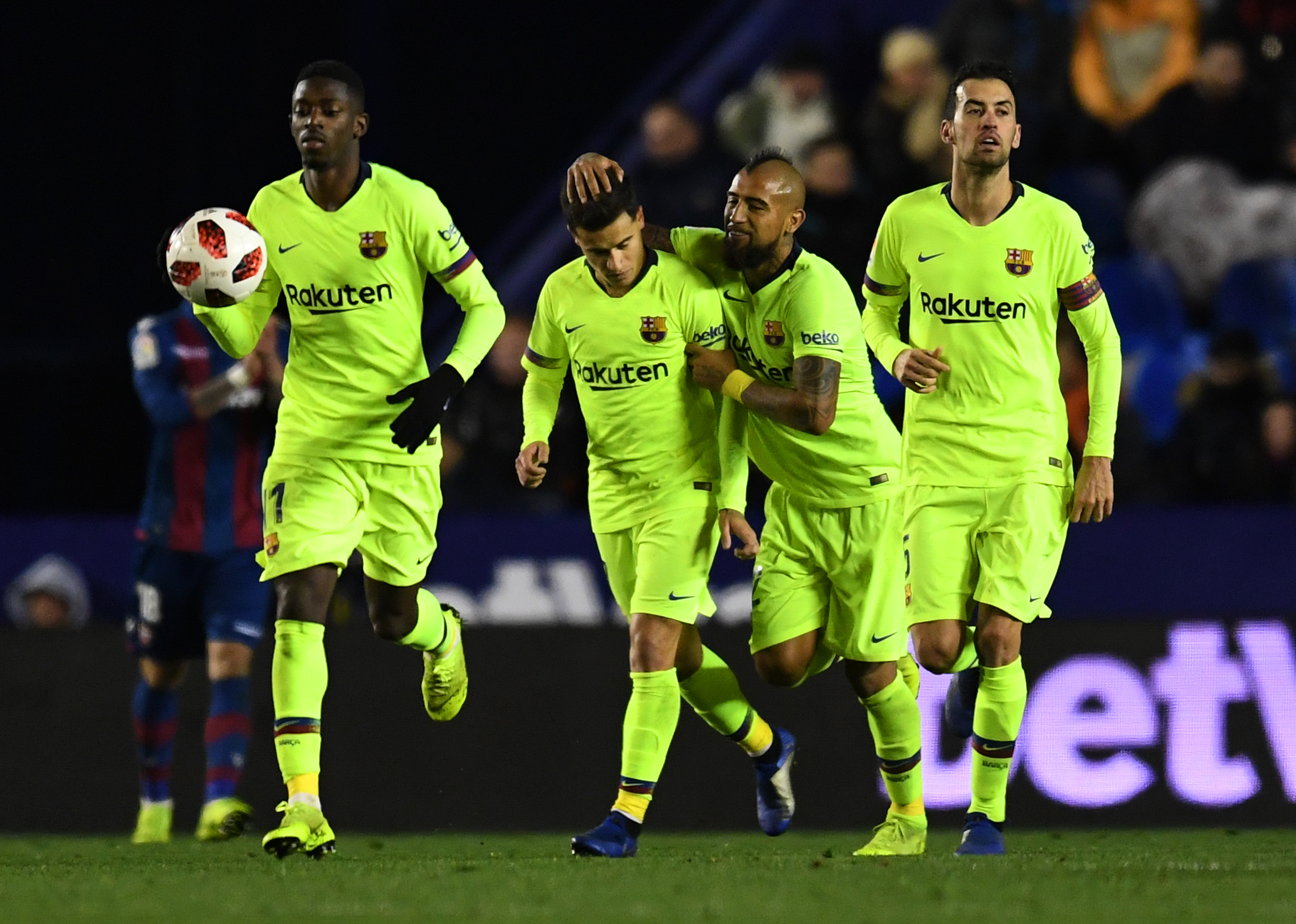 VALENCIA, SPAIN - JANUARY 10:  Philippe Coutinho of Barcelona (2L) celebrates after scoring his team's first goal with Ousmane Dembele (L), Arturo Vidal (2R) and Sergio Busquets (R) during the Copa del Rey Round of 16 match between Levante and FC Barcelona at Ciutat de Valencia on January 10, 2019 in Valencia, Spain. (Photo by David Ramos/Getty Images)