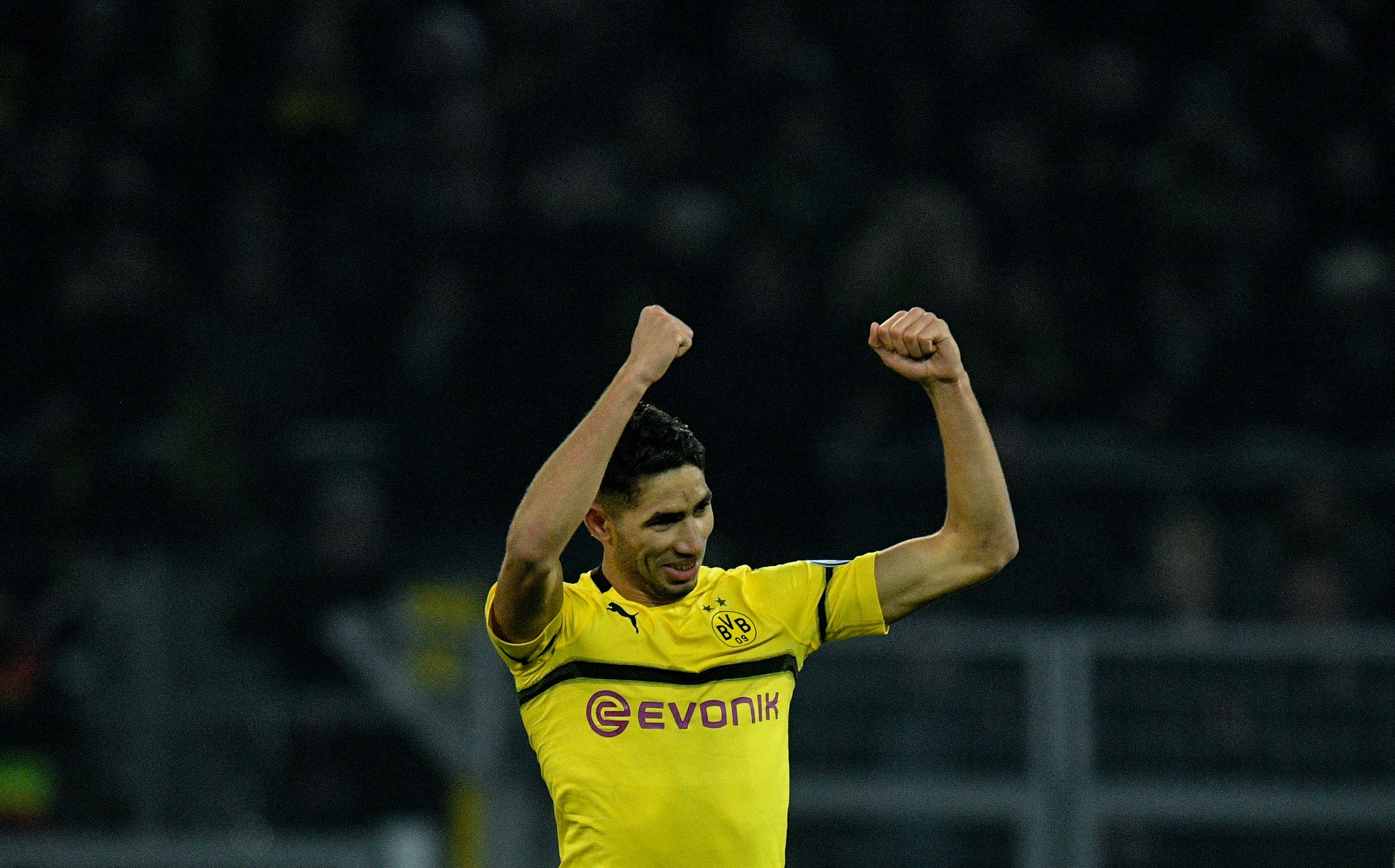 Dortmund's defender Achraf Hakimi celebrates scoring the 3-2 goal during the German Cup (DFB Pokal) last 16 football match BVB Borussia Dortmund v Werder Bremen in Dortmund, western Germany on February 5, 2019. (Photo by SASCHA SCHUERMANN / AFP) / DFB REGULATIONS PROHIBIT ANY USE OF PHOTOGRAPHS AS IMAGE SEQUENCES AND QUASI-VIDEO.        (Photo credit should read SASCHA SCHUERMANN/AFP/Getty Images)