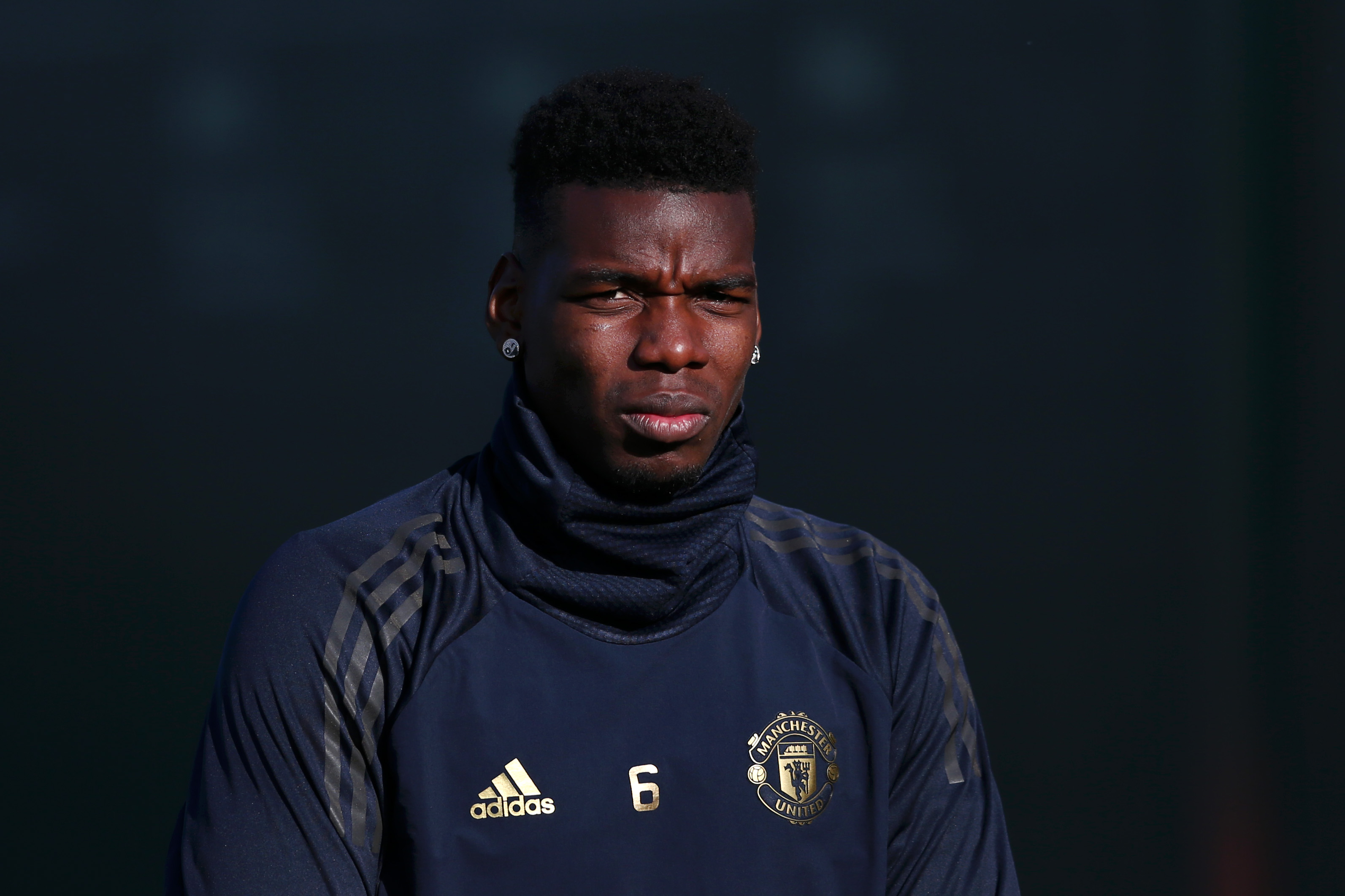MANCHESTER, ENGLAND - FEBRUARY 11:  Paul Pogba of Manchester United arrives for a training session ahead of their UEFA Champions League Round of 16 match against Paris Saint-Germain F.C. at Aon Training Complex on February 11, 2019 in Manchester, England.  (Photo by Jan Kruger/Getty Images)