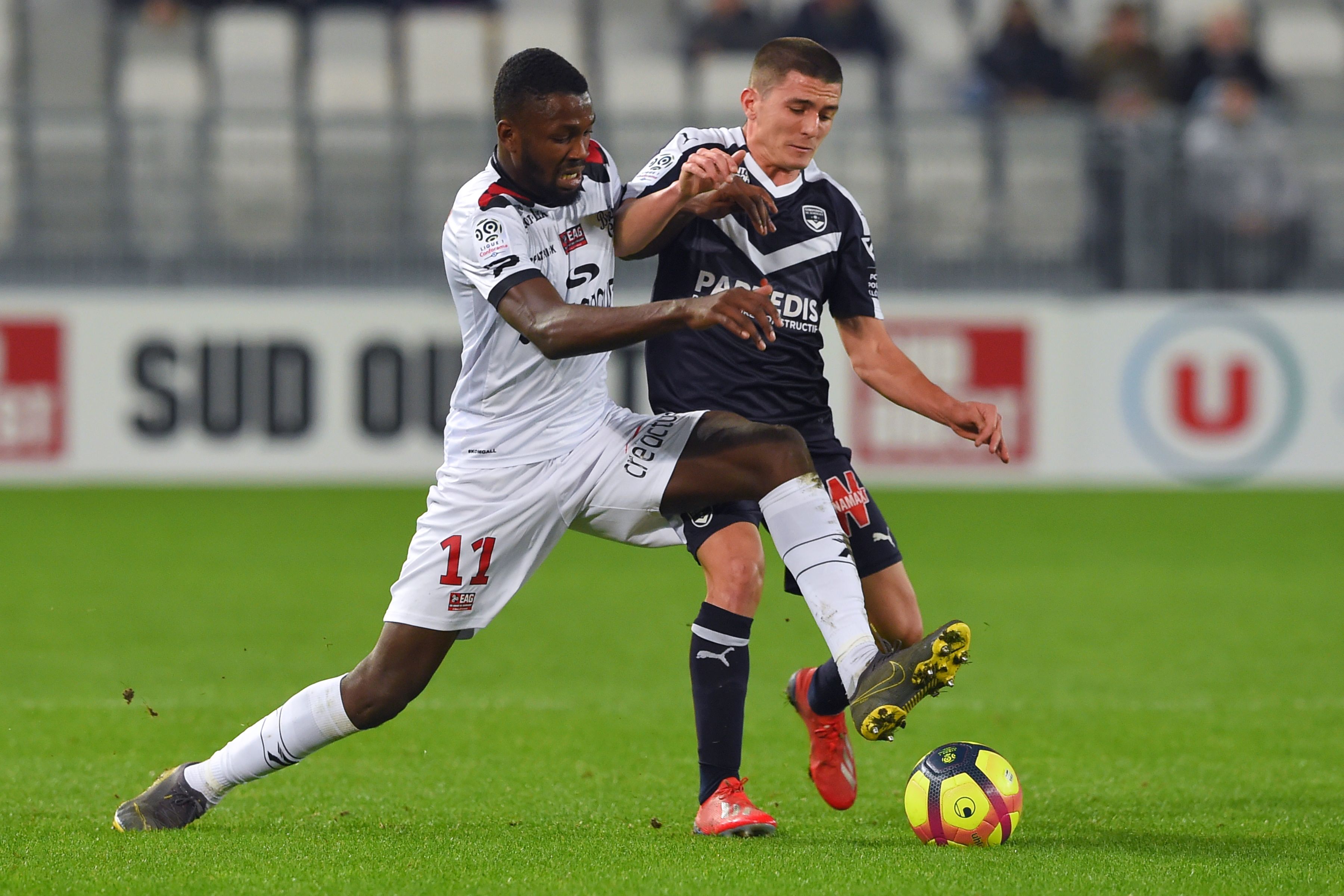 Bordeaux's Spanish defender Sergi Palencia (R) vies with Guingamp's French forward Marcus Thuram (L) during the French L1 football match between Bordeaux (FCGB) and Guingamp (EAG) on February 20, 2019, at the Matmut Atlantique Stadium in Bordeaux, southwestern France. (Photo by NICOLAS TUCAT / AFP)        (Photo credit should read NICOLAS TUCAT/AFP/Getty Images)