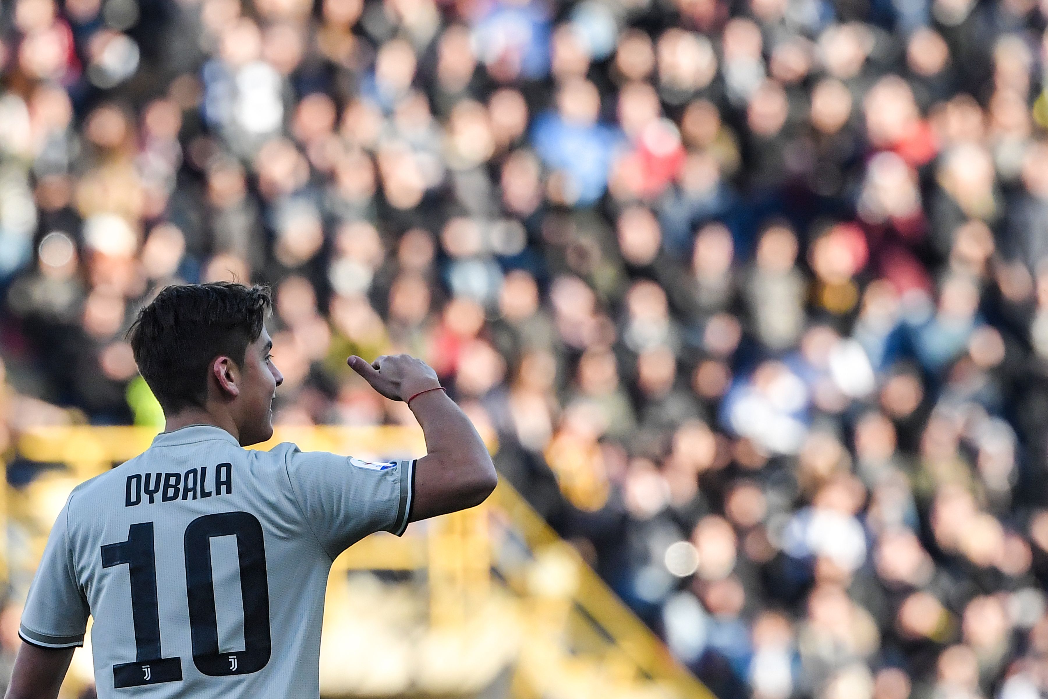 Juventus' Argentine forward Paulo Dybala celebrates after opening the scoring during the Italian Serie A football match Bologna vs Juventus on February 24, 2019 at the Renato-Dall'Ara stadium in Bologna. (Photo by Tiziana FABI / AFP)        (Photo credit should read TIZIANA FABI/AFP/Getty Images)