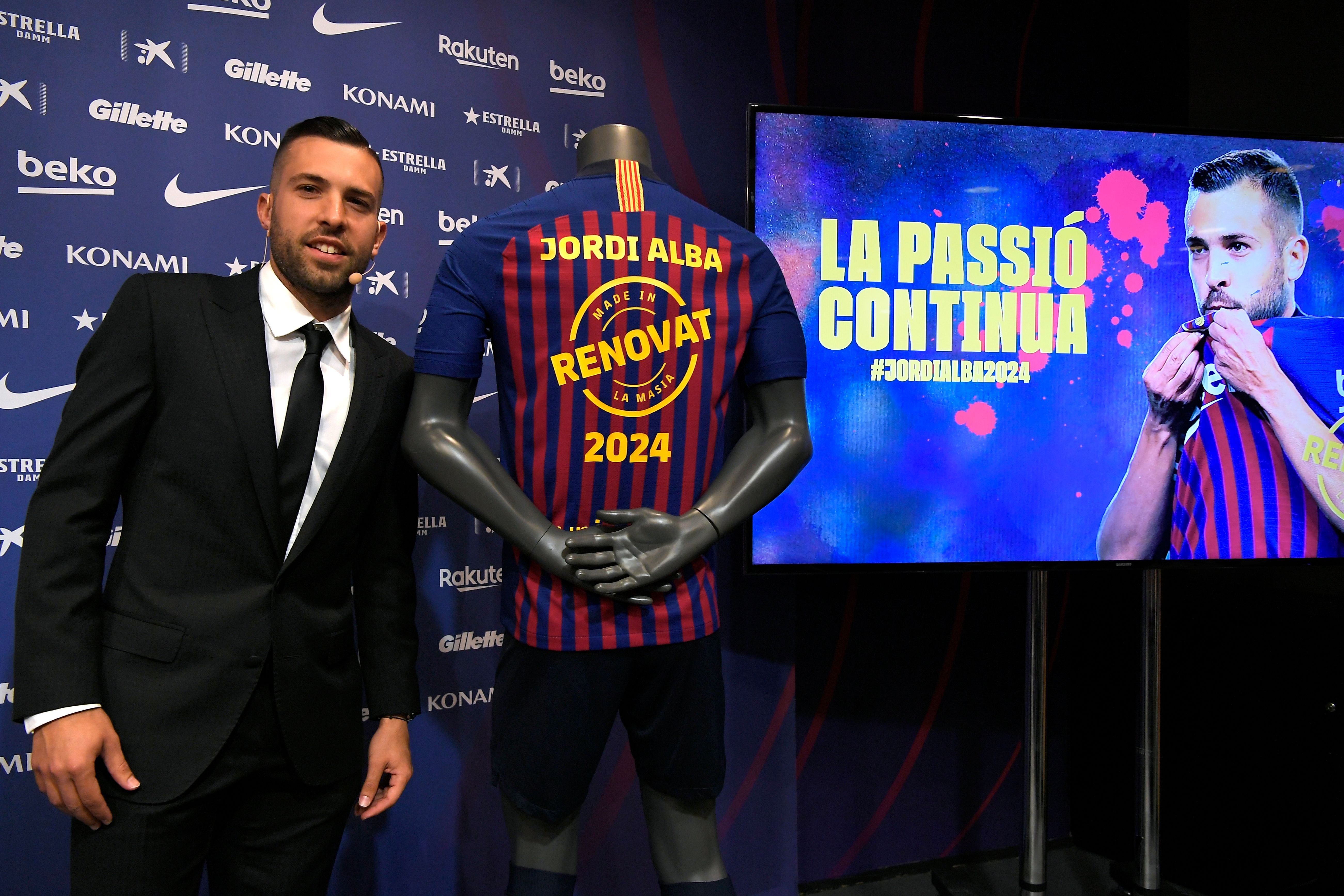 FC Barcelona's Spanish defender Jordi Alba poses during a press conference to officially announce his contract renewal at the Camp Nou stadium in Barcelona on March 11, 2019 (Photo by LLUIS GENE / AFP)        (Photo credit should read LLUIS GENE/AFP/Getty Images)