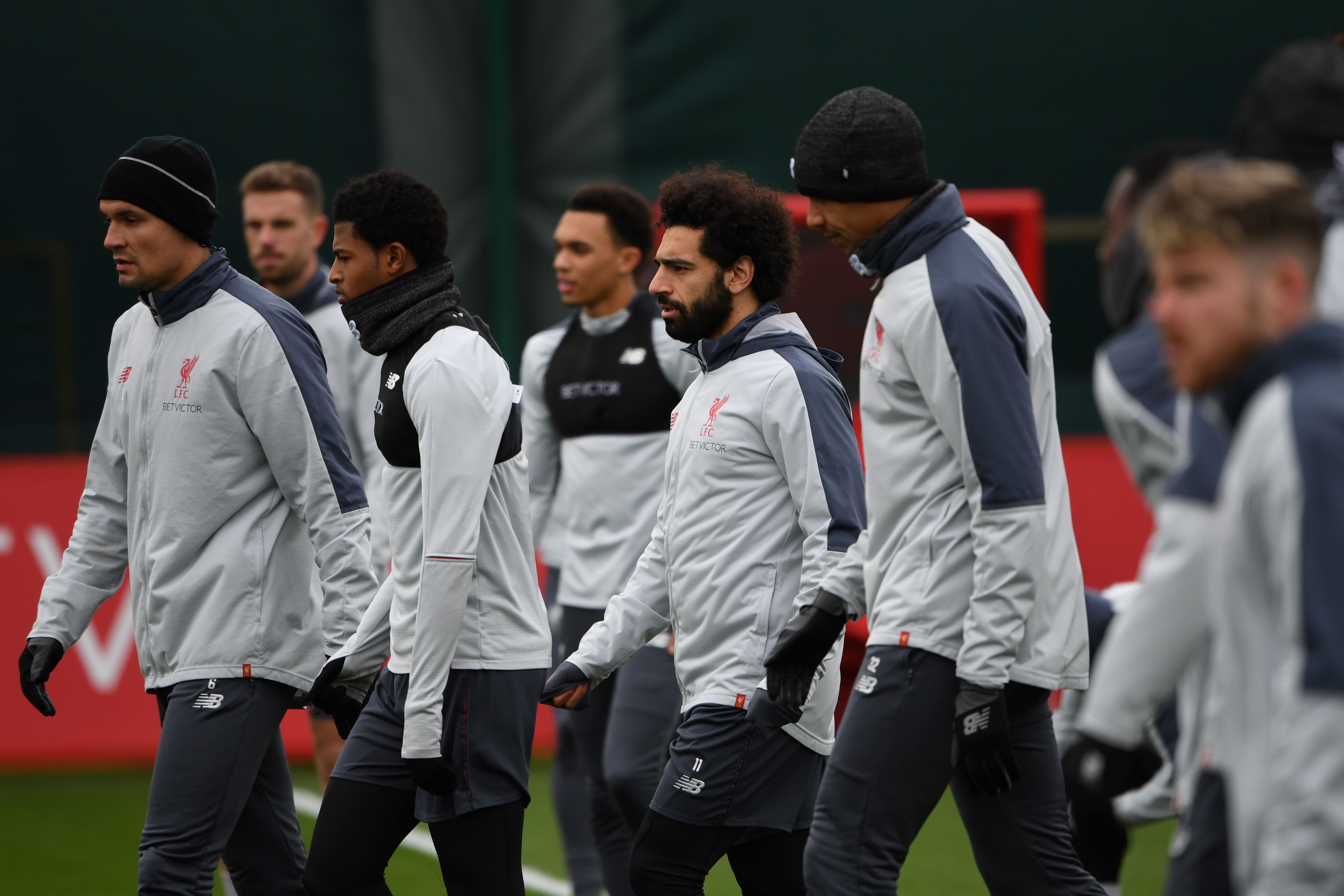 Liverpool's Egyptian midfielder Mohamed Salah (C) joins teammates in a team training session at Melwood in Liverpool, north west England on March 12, 2019, on the eve of their Champions League round of 16, second leg football match against Bayern Munich. (Photo by Paul ELLIS / AFP)        (Photo credit should read PAUL ELLIS/AFP/Getty Images)