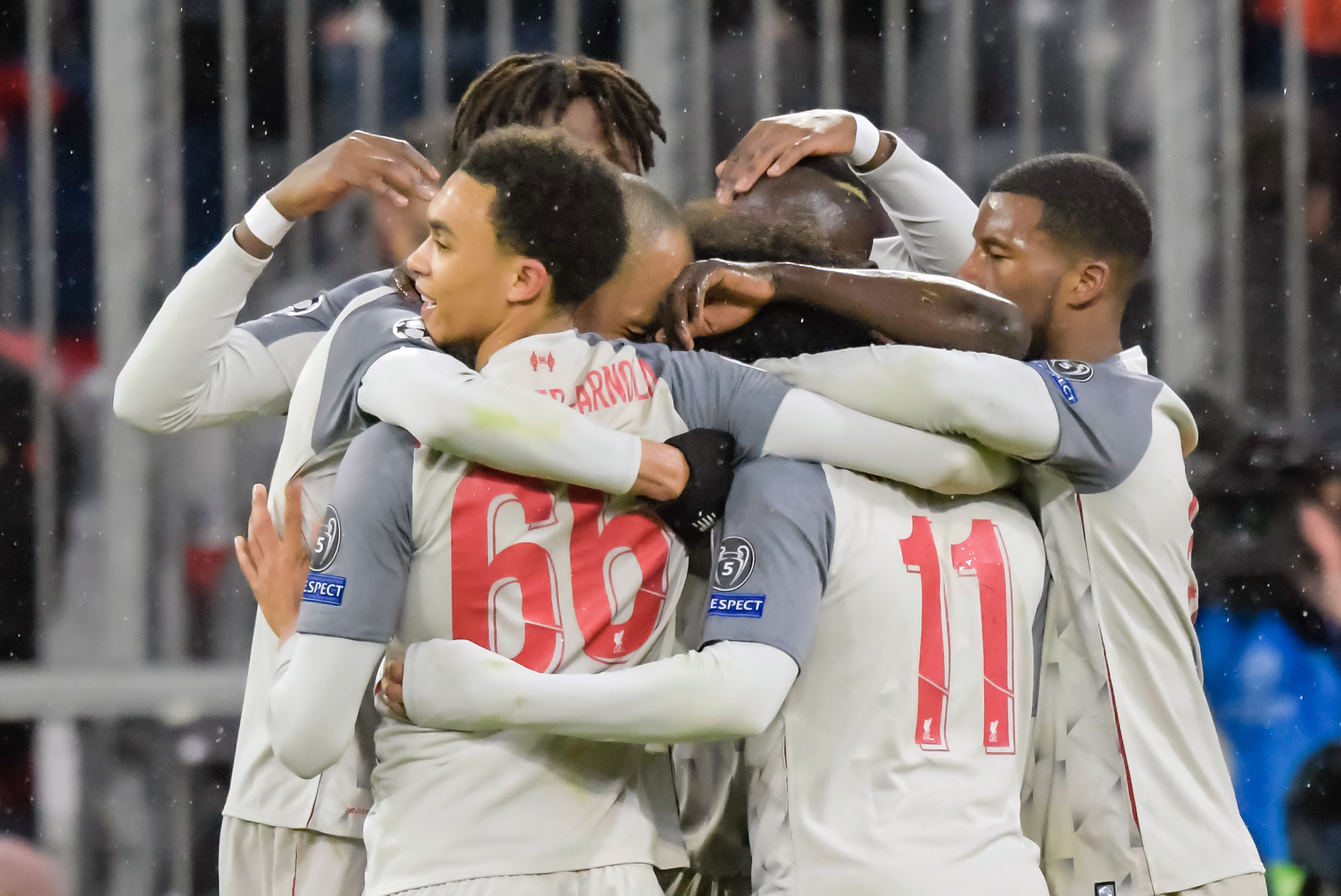 Liverpool's players celebrates scoring the 1-3 goal during the UEFA Champions League, last 16, second leg football match Bayern Munich v Liverpool in Munich, southern Germany, on March 13, 2019. (Photo by GUENTER SCHIFFMANN / AFP)        (Photo credit should read GUENTER SCHIFFMANN/AFP/Getty Images)