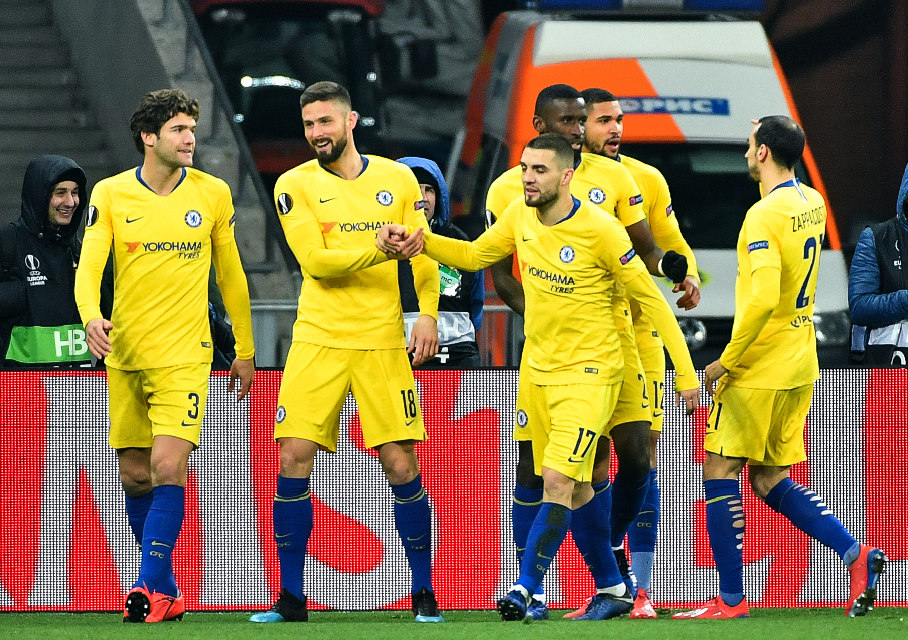 Chelsea's French forward Olivier Giroud (2nd L) celebrates with teammates after scoring a goal during the UEFA Europa League round of 16, second leg football match between FC Dynamo Kyiv and Chelsea FC at NSK Olimpiyskyi stadium in Kiev on March 14, 2019. (Photo by Sergei SUPINSKY / AFP)        (Photo credit should read SERGEI SUPINSKY/AFP/Getty Images)