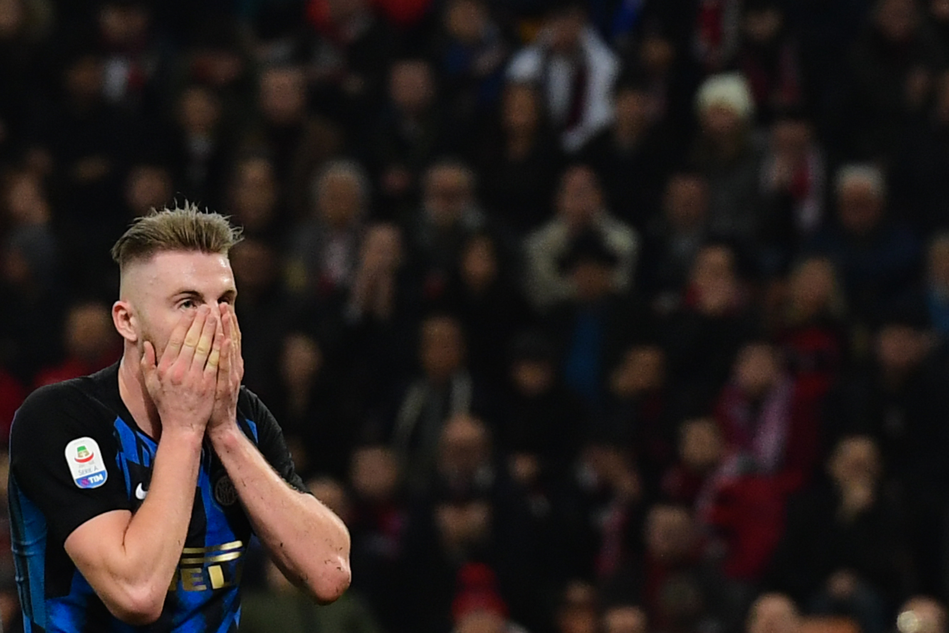 Inter Milan's Slovak defender Milan Skriniar reacts after missing a goal during the Italian Serie A football match AC Milan vs Inter Milan at the San Siro stadium in Milan on March 17, 2019. (Photo by Miguel MEDINA / AFP)        (Photo credit should read MIGUEL MEDINA/AFP/Getty Images)