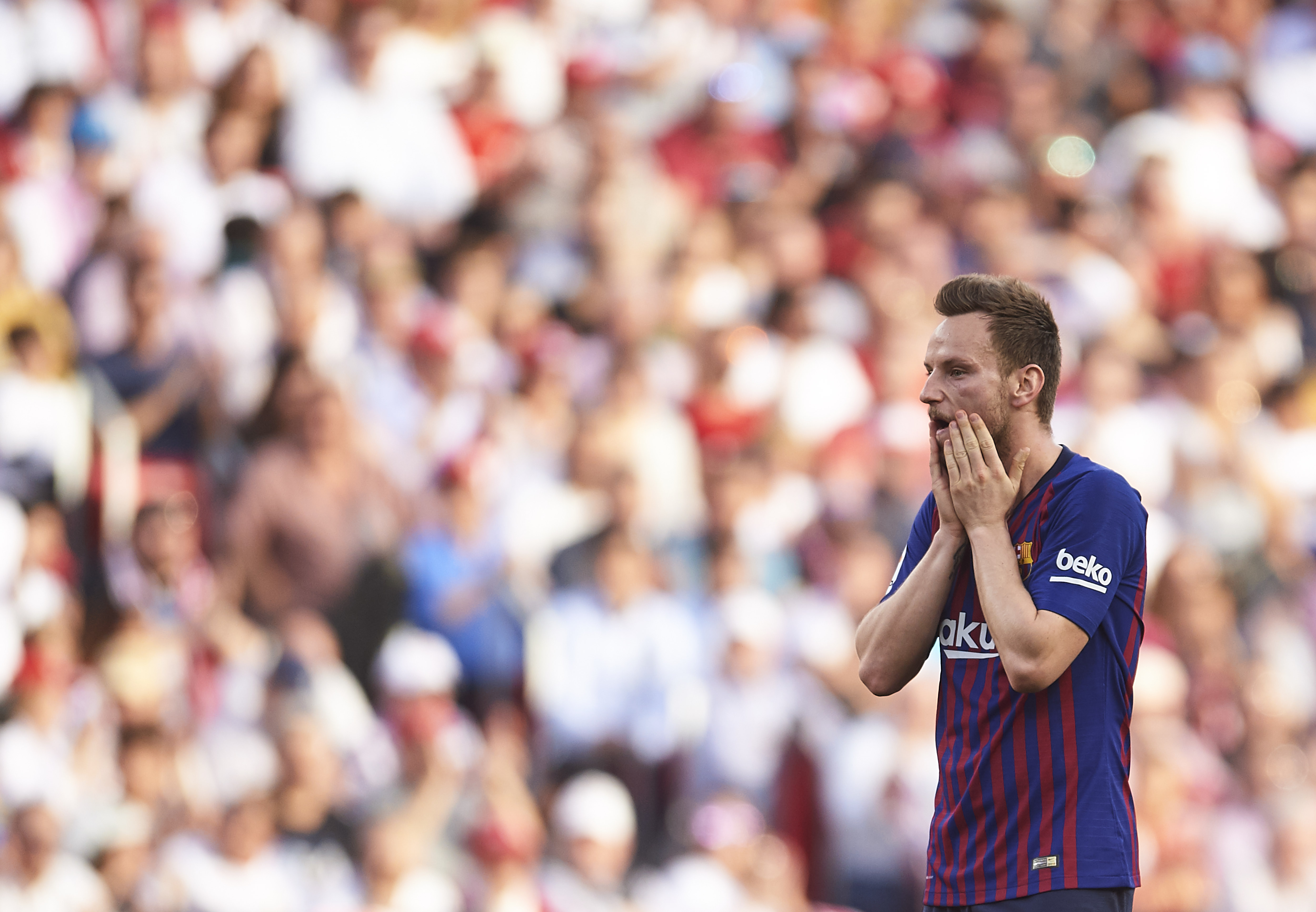 SEVILLE, SPAIN - FEBRUARY 23: Ivan Rakitic of FC Barcelona reacts during the La Liga match between Sevilla FC and FC Barcelona at Estadio Ramon Sanchez Pizjuan on February 23, 2019 in Seville, Spain. (Photo by Aitor Alcalde/Getty Images)