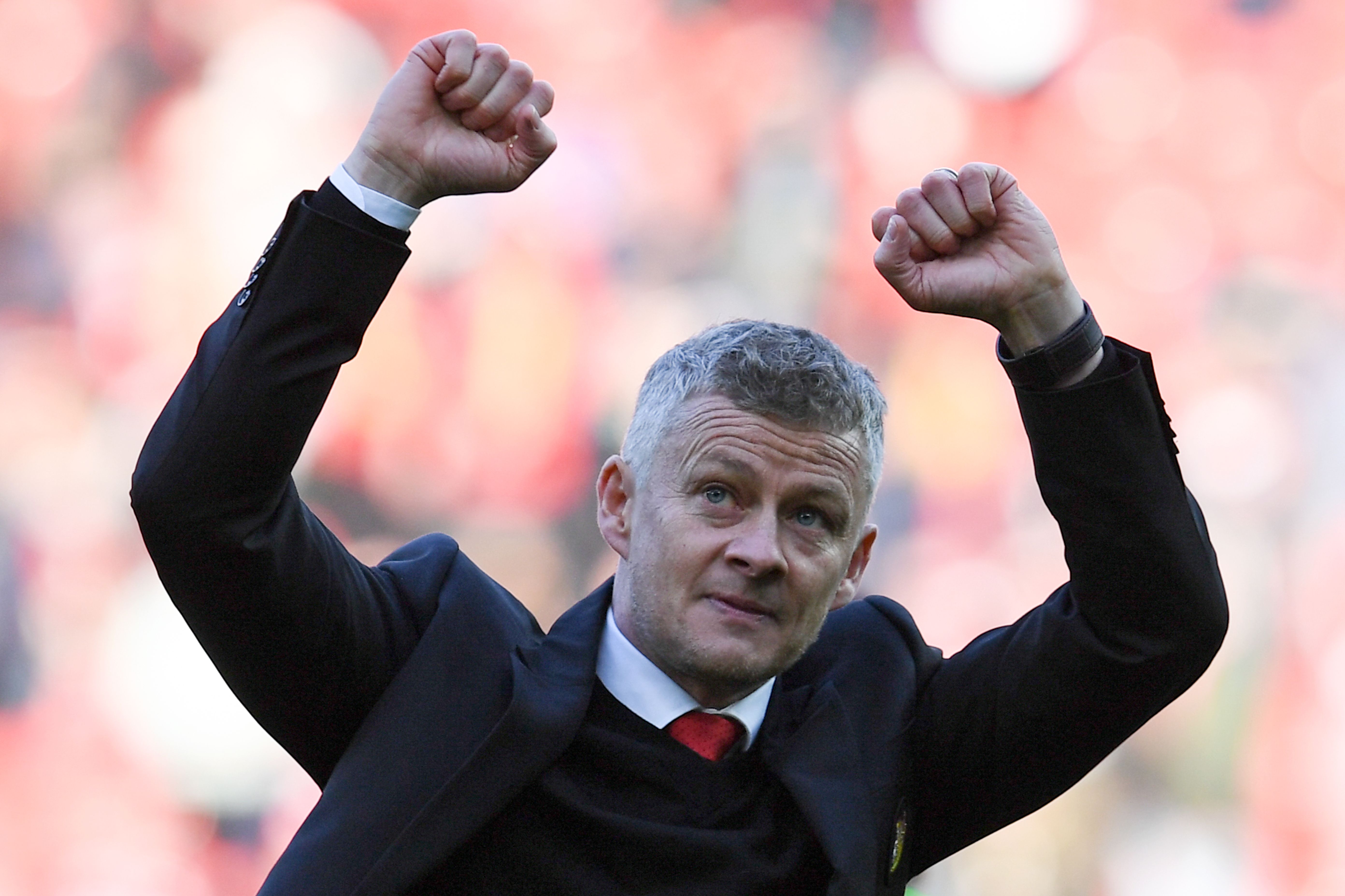 Manchester United's Norwegian manager Ole Gunnar Solskjaer applauds the fans after the final whistle of the English Premier League football match between Manchester United and Watford at Old Trafford in Manchester, north west England, on March 30, 2019. (Photo by Paul ELLIS / AFP) / RESTRICTED TO EDITORIAL USE. No use with unauthorized audio, video, data, fixture lists, club/league logos or 'live' services. Online in-match use limited to 120 images. An additional 40 images may be used in extra time. No video emulation. Social media in-match use limited to 120 images. An additional 40 images may be used in extra time. No use in betting publications, games or single club/league/player publications. /         (Photo credit should read PAUL ELLIS/AFP/Getty Images)