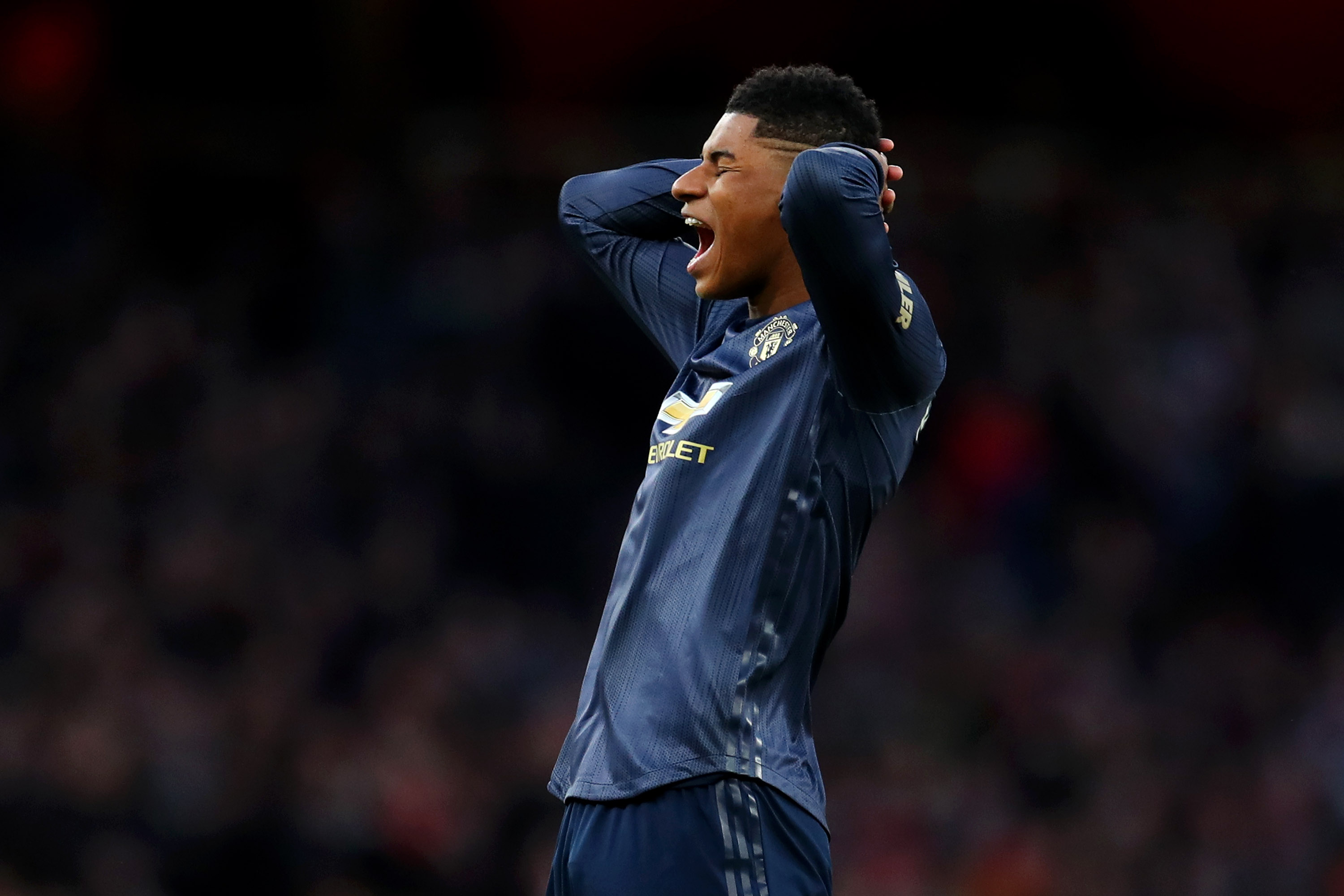 LONDON, ENGLAND - MARCH 10: Marcus Rashford of Manchester United reacts after missing a freekick during the Premier League match between Arsenal FC and Manchester United at Emirates Stadium on March 10, 2019 in London, United Kingdom. (Photo by Catherine Ivill/Getty Images)