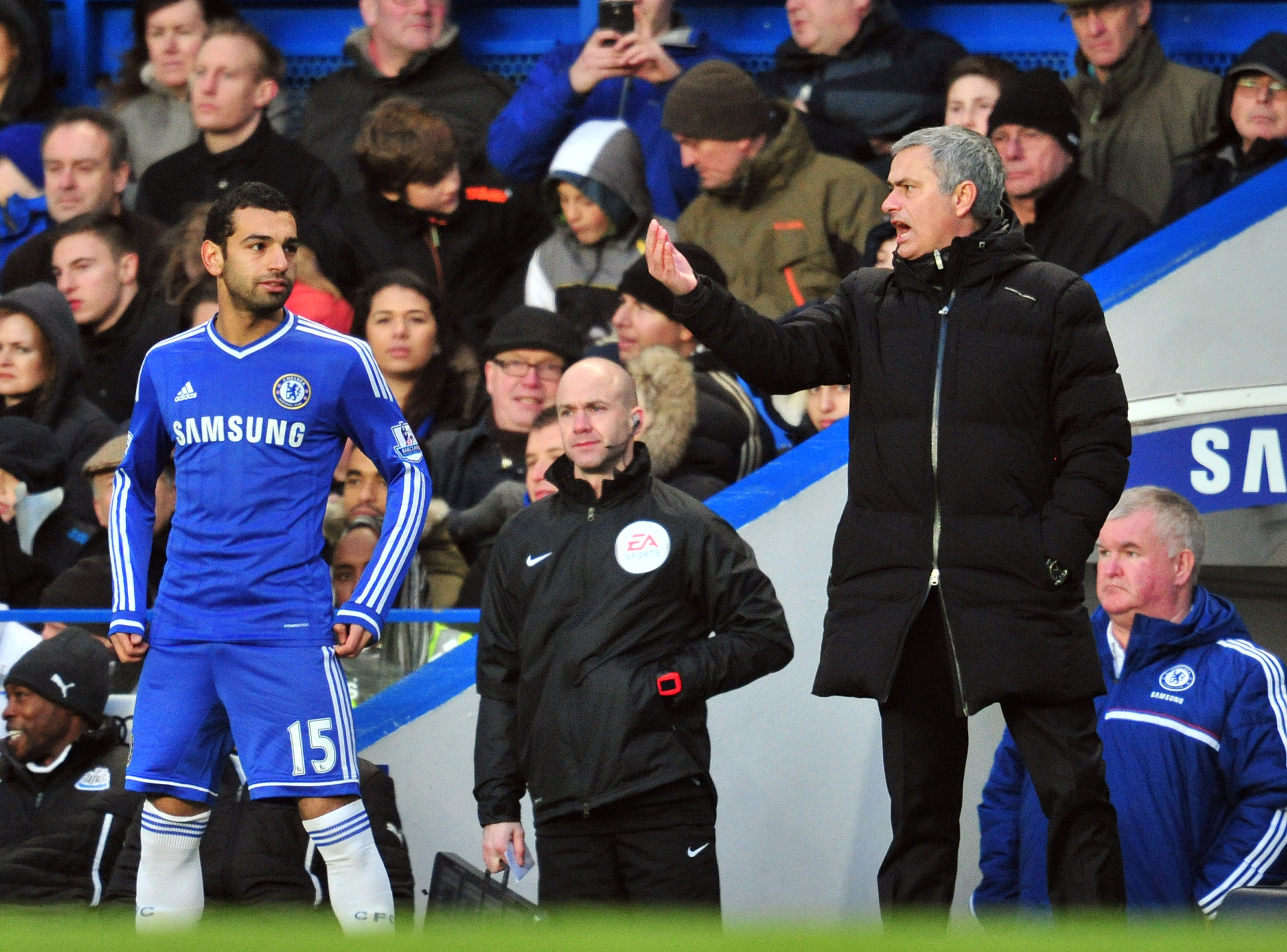 Chelsea's Portuguese manager Jose Mourinho (R) gives instructions to Chelsea's Egyptian midfielder Mohamed Salah (L) during the English Premier League football match between Chelsea and Newcastle United at Stamford Bridge in west London on February 8, 2014. Chelsea won the game 3-0. AFP PHOTO / GLYN KIRK

RESTRICTED TO EDITORIAL USE. No use with unauthorized audio, video, data, fixture lists, club/league logos or live services. Online in-match use limited to 45 images, no video emulation. No use in betting, games or single club/league/player publications.        (Photo credit should read GLYN KIRK/AFP/Getty Images)