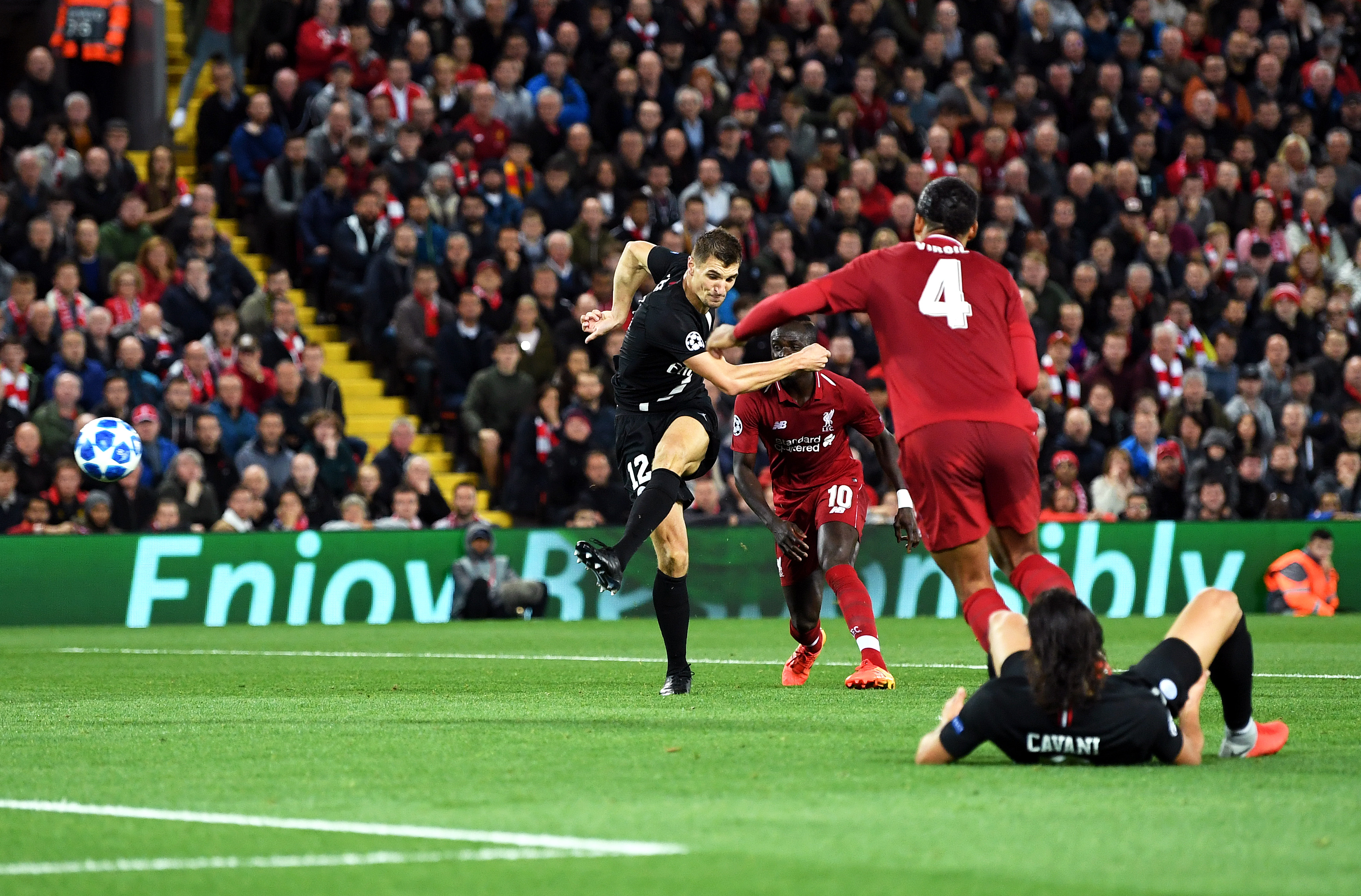 LIVERPOOL, ENGLAND - SEPTEMBER 18:  Thomas Meunier of Paris Saint-Germain scores his team's first goal during the Group C match of the UEFA Champions League between Liverpool and Paris Saint-Germain at Anfield on September 18, 2018 in Liverpool, United Kingdom.  (Photo by Michael Regan/Getty Images)