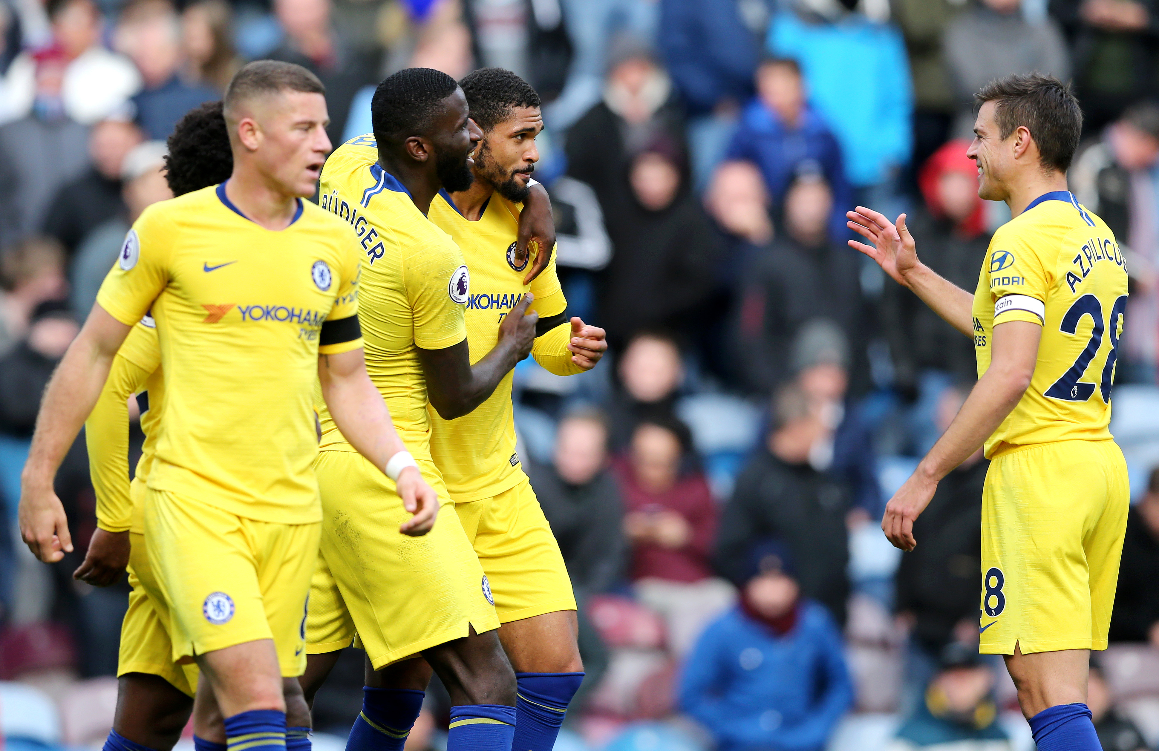 BURNLEY, ENGLAND - OCTOBER 28:  Ruben Loftus-Cheek of Chelsea celebrates with teammates Ross Barkley, Antonio Ruediger and Cesar Azpilicueta after scoring his sides fourth goal during the Premier League match between Burnley FC and Chelsea FC at Turf Moor on October 28, 2018 in Burnley, United Kingdom.  (Photo by Nigel Roddis/Getty Images)
