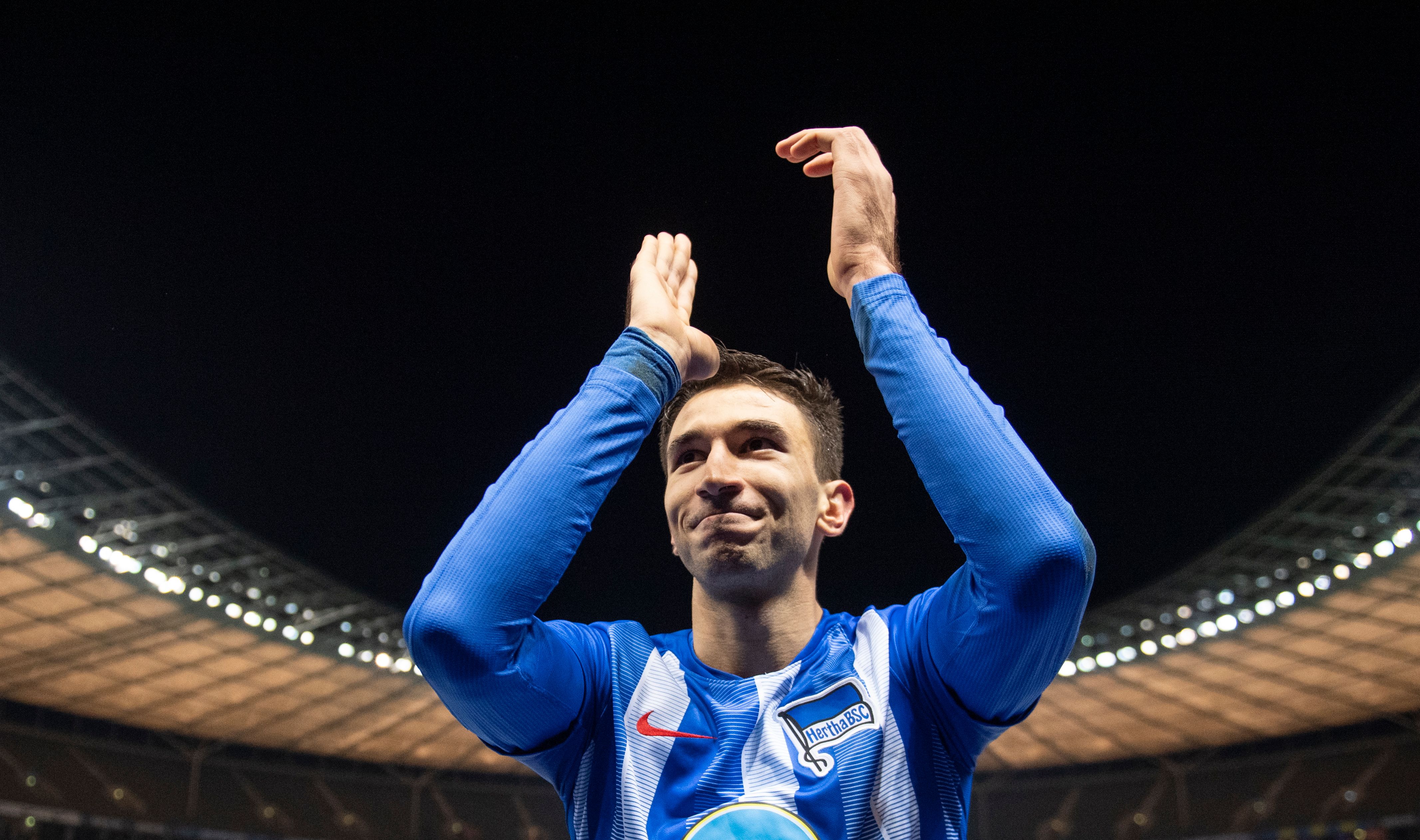 Berlin´s Serbian midfielder Marko Grujic celebrates after winning the German first division Bundesliga football match between Hertha Berlin v Eintracht Frankfurt at the Olympic stadium in Berlin on December 8, 2018. (Photo by ROBERT MICHAEL / AFP) / RESTRICTIONS: DFL REGULATIONS PROHIBIT ANY USE OF PHOTOGRAPHS AS IMAGE SEQUENCES AND/OR QUASI-VIDEO        (Photo credit should read ROBERT MICHAEL/AFP/Getty Images)