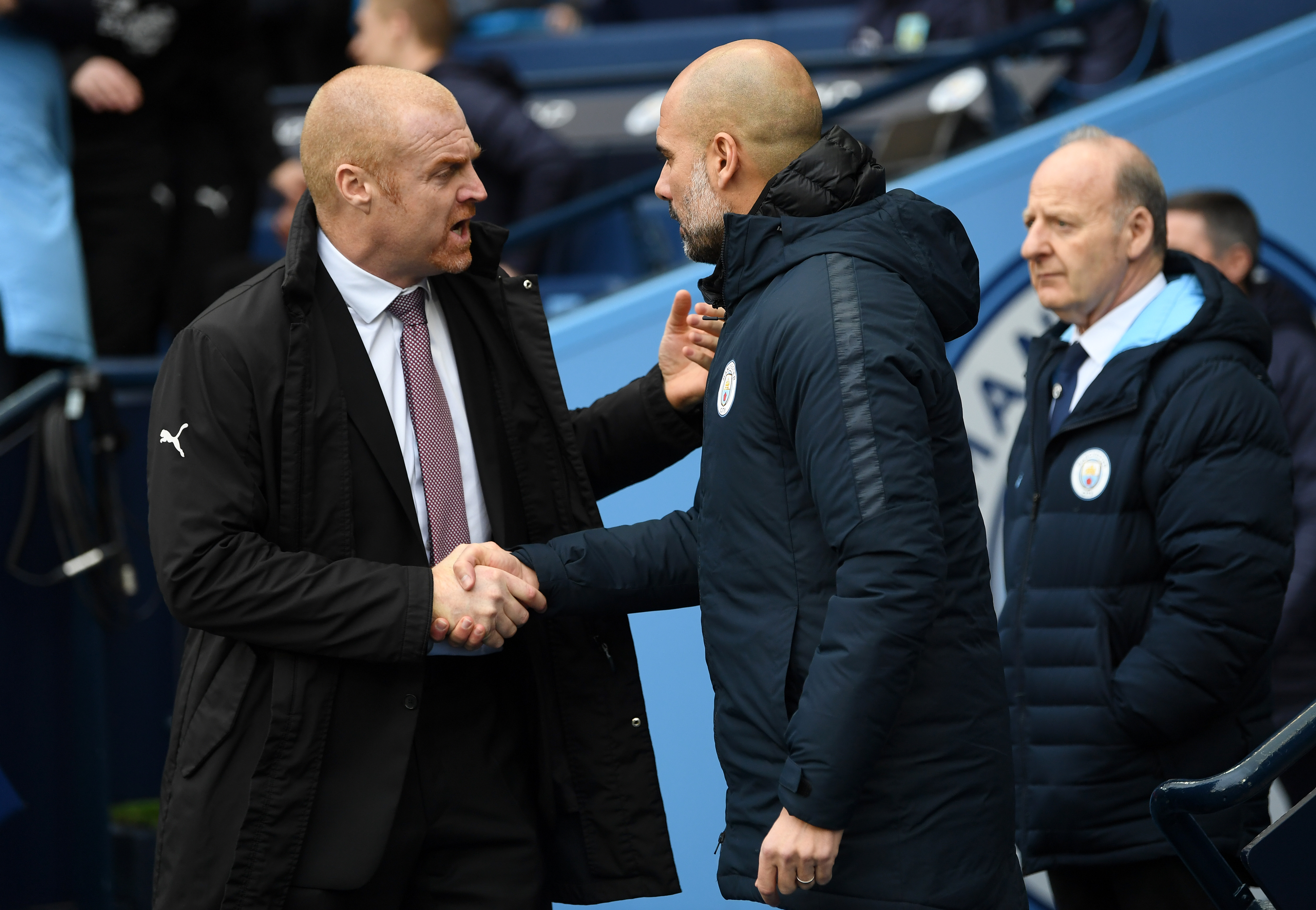 MANCHESTER, ENGLAND - JANUARY 26:  Josep Guardiola, Manager of Manchester City greets Sean Dyche, Manager of Burnley prior to the FA Cup Fourth Round match between Manchester City and Burnley at Etihad Stadium on January 26, 2019 in Manchester, United Kingdom.  (Photo by Michael Regan/Getty Images)