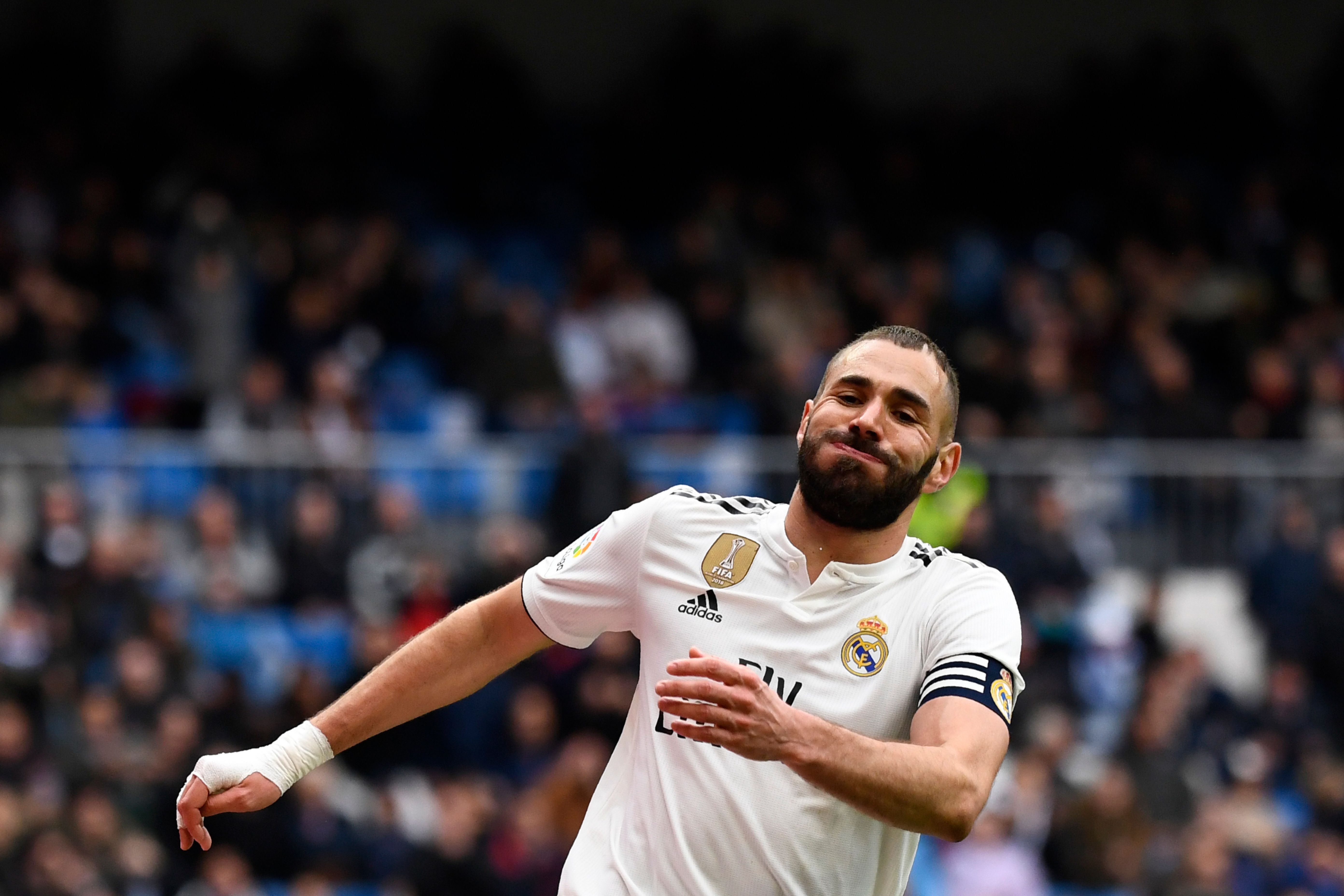 Real Madrid's French forward Karim Benzema reacts during the Spanish league football match between Real Madrid CF and SD Eibar at the Santiago Bernabeu stadium in Madrid on April 6, 2019. (Photo by GABRIEL BOUYS / AFP)        (Photo credit should read GABRIEL BOUYS/AFP/Getty Images)