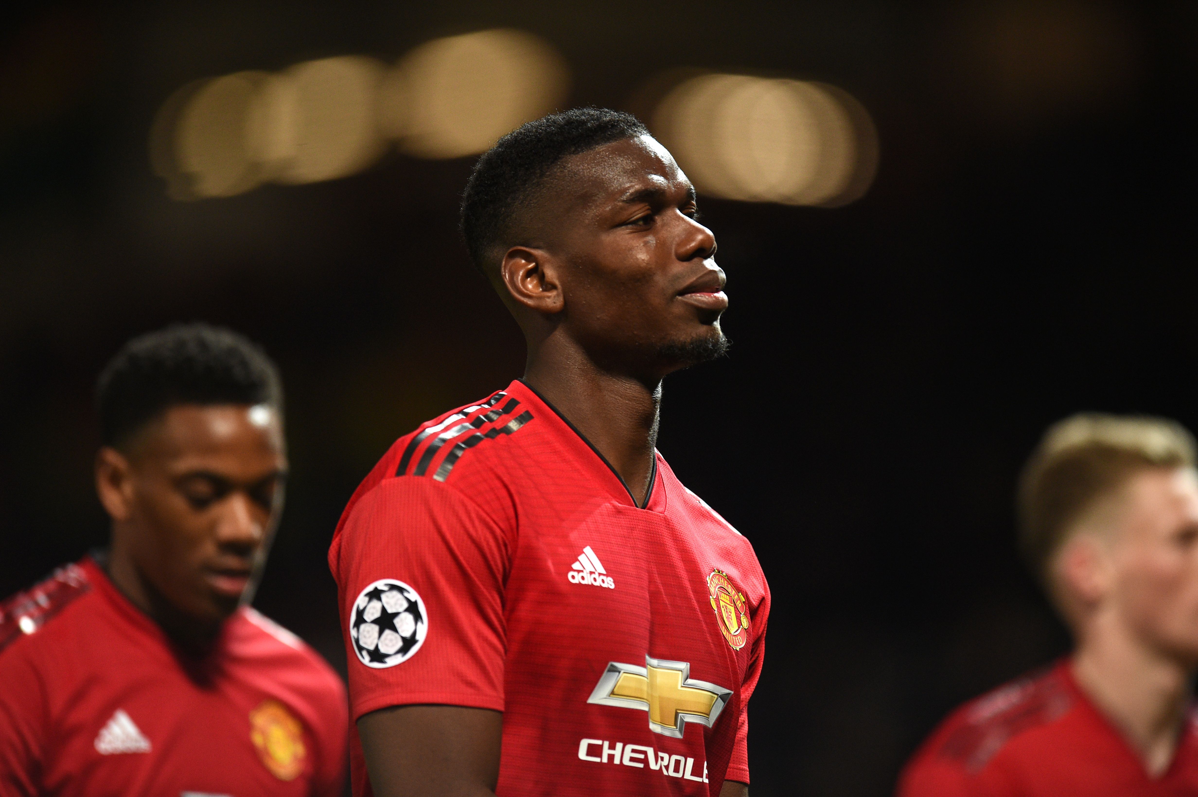 Manchester United's French midfielder Paul Pogba reacts after losing the UEFA Champions league first leg quarter-final football match between Manchester United and Barcelona at Old Trafford in Manchester, north west England, on April 10, 2019. (Photo by Oli SCARFF / AFP)        (Photo credit should read OLI SCARFF/AFP/Getty Images)