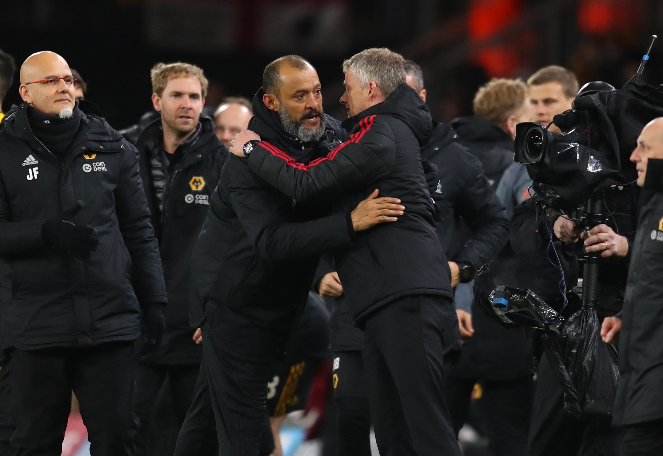 WOLVERHAMPTON, ENGLAND - MARCH 16: Nuno Espirito Santo manager of Wolverhampton Wanderers an Ole Gunnar Solskjaer interim manager of Manchester United hug after the FA Cup Quarter Final match between Wolverhampton Wanderers and Manchester United at Molineux on March 16, 2019 in Wolverhampton, England. (Photo by Catherine Ivill/Getty Images)