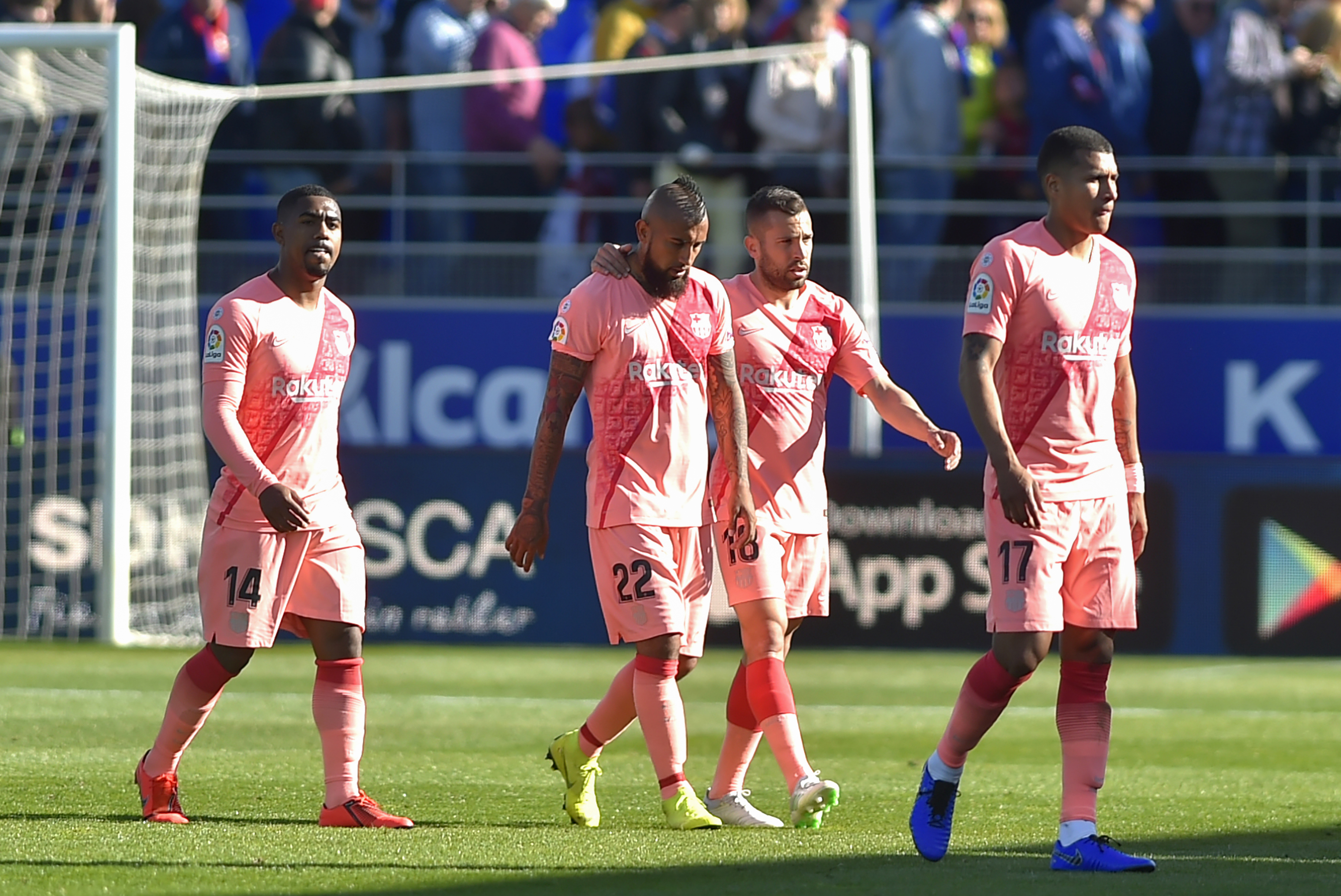 (FromL) Barcelona's Brazilian midfielder Malcom, Barcelona's Chilean midfielder Arturo Vidal, Barcelona's Spanish defender Jordi Alba and Barcelona's Colombian defender Jeison Murillo leave the pitch after the Spanish league football match between SD Huesca and FC Barcelona at the El Alcoraz stadium in Huesca on April 13, 2019. (Photo by ANDER GILLENEA / AFP)        (Photo credit should read ANDER GILLENEA/AFP/Getty Images)
