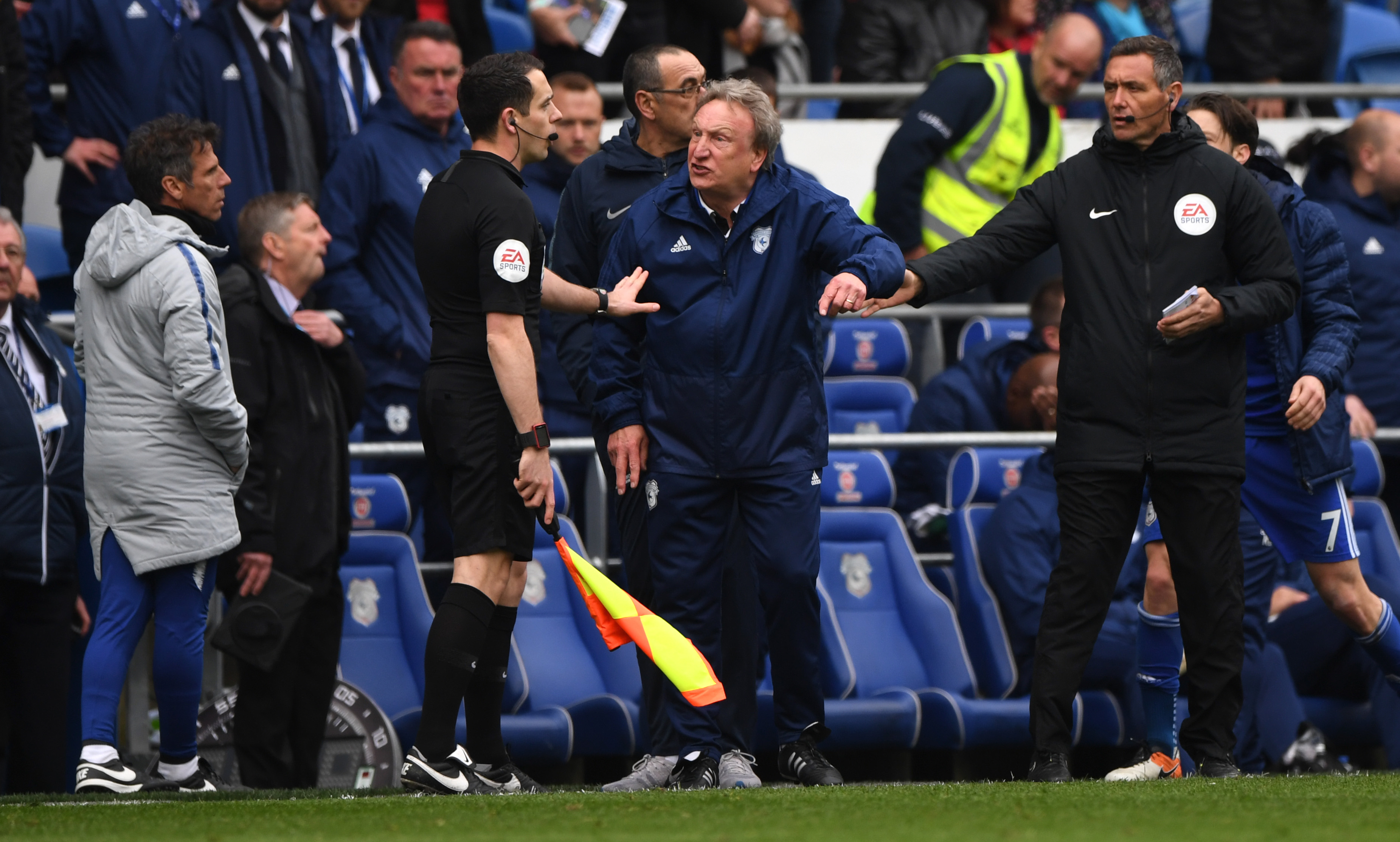 CARDIFF, WALES - MARCH 31: Cardiff manager Neil Warnock confronts the assistant referee during the Premier League match between Cardiff City and Chelsea FC at Cardiff City Stadium on March 31, 2019 in Cardiff, United Kingdom. (Photo by Stu Forster/Getty Images)