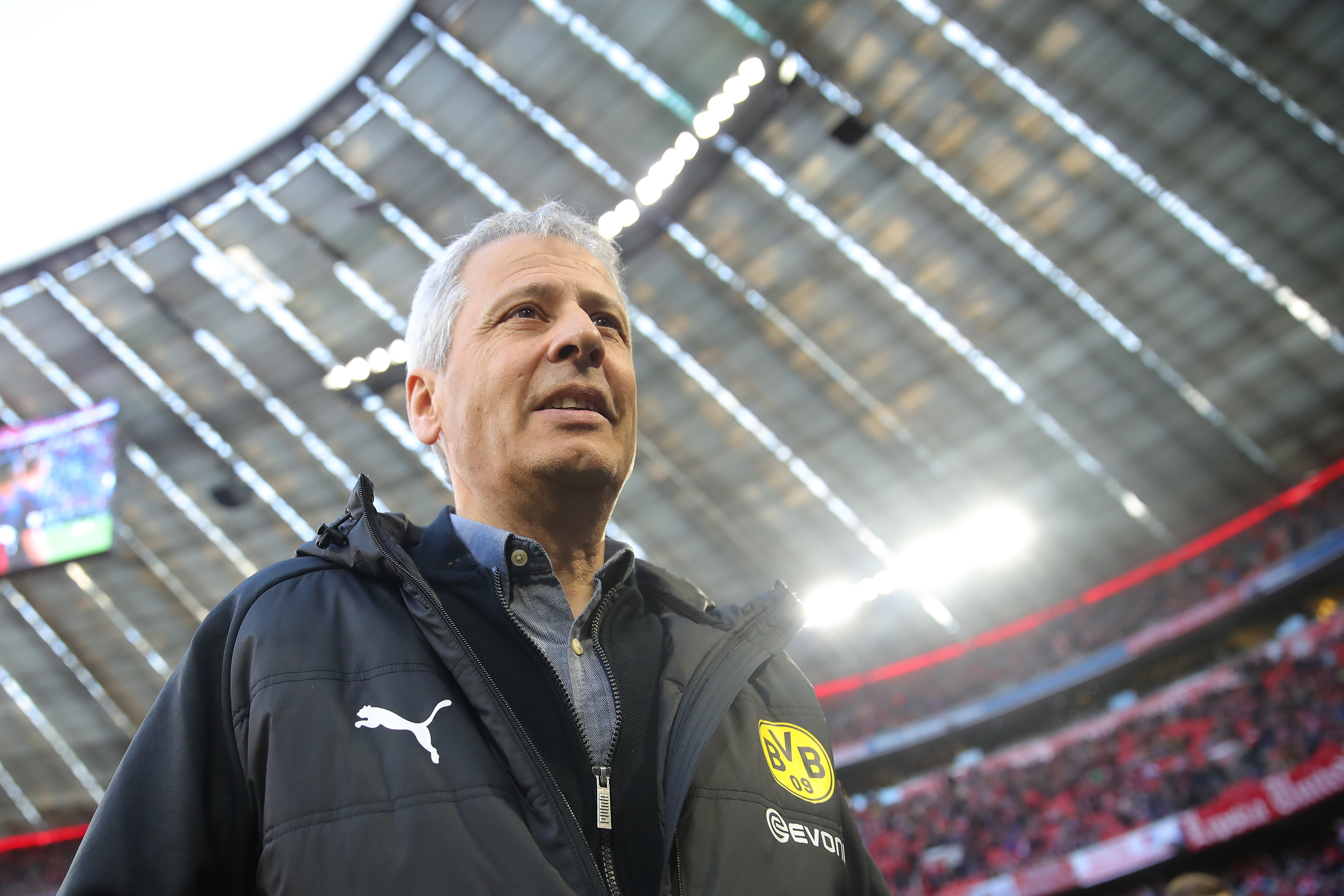 MUNICH, GERMANY - APRIL 06: Lucien Favre, head coach of Dortmund looks on prior to the Bundesliga match between FC Bayern Muenchen and Borussia Dortmund at Allianz Arena on April 06, 2019 in Munich, Germany. (Photo by Alexander Hassenstein/Bongarts/Getty Images)