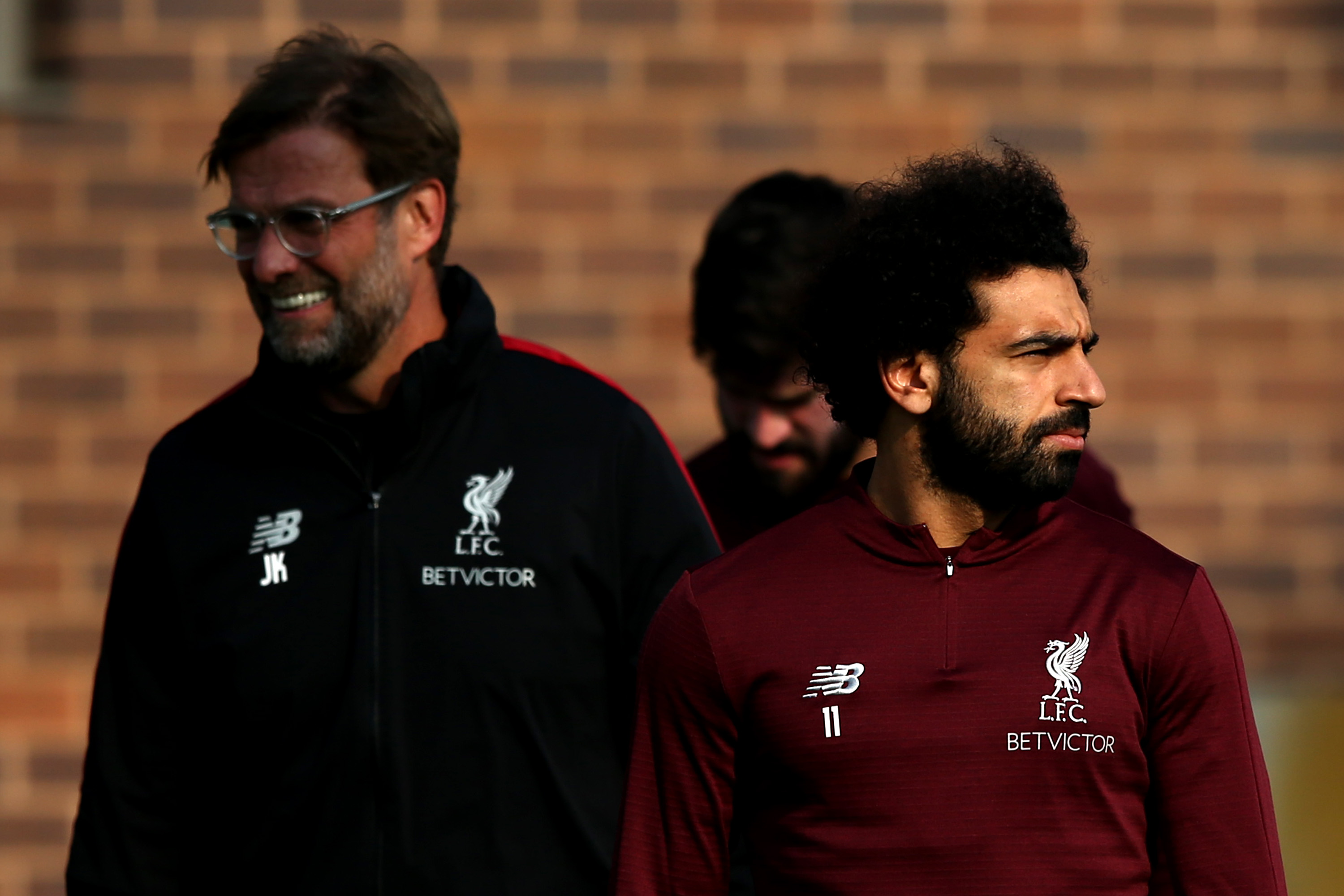 LIVERPOOL, ENGLAND - APRIL 08: Mohamed Salah and Jurgen Klopp, Manager of Liverpool during a Liverpool training session ahead of their UEFA Champions League quarter-final match against FC Porto. At Melwood Training Ground on April 08, 2019 in Liverpool, England. (Photo by Jan Kruger/Getty Images)