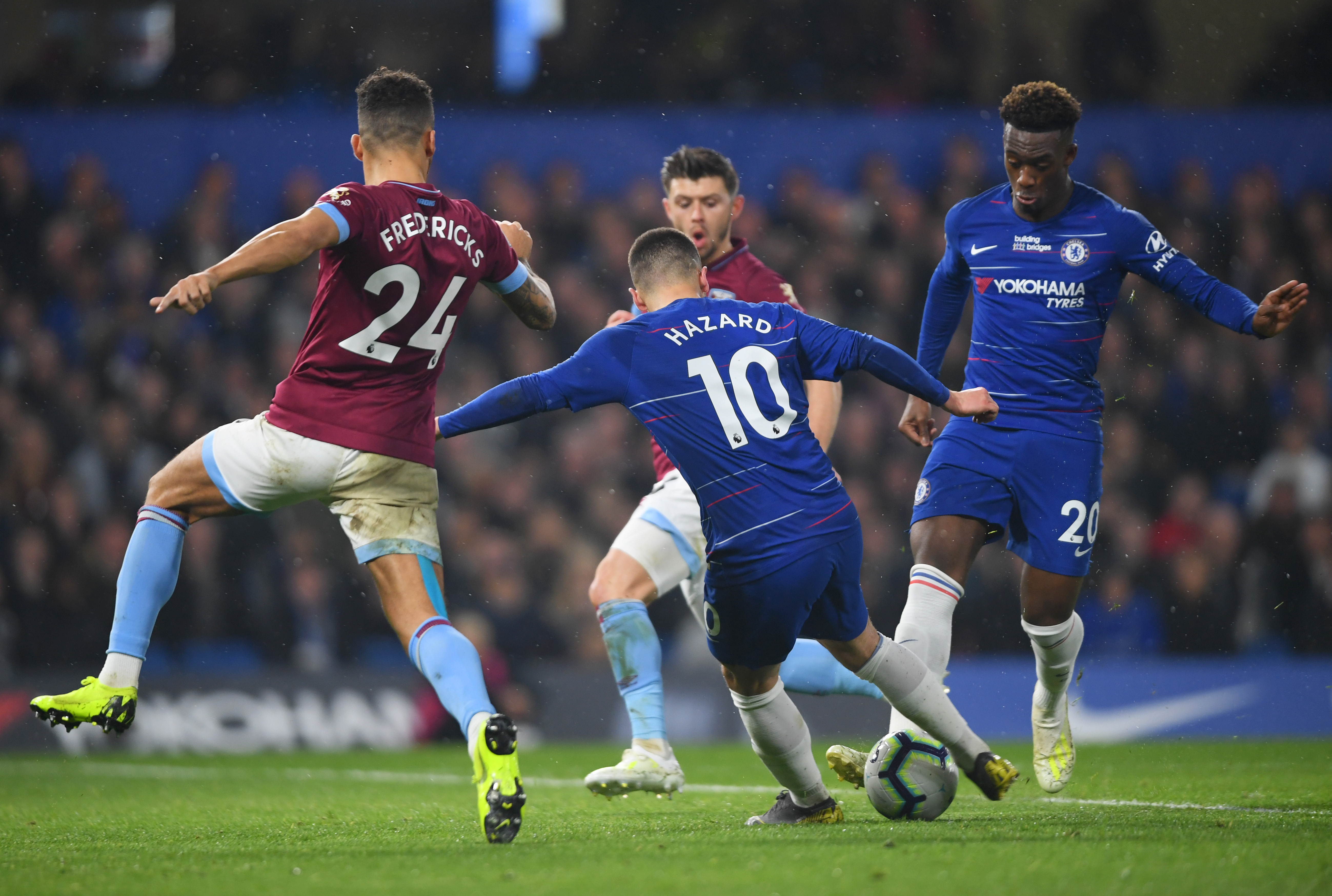 LONDON, ENGLAND - APRIL 08:  Eden Hazard of Chelsea (10) is accidentally blocked by team mate Callum Hudson-Odoi (20) as he shoots during the Premier League match between Chelsea FC and West Ham United at Stamford Bridge on April 08, 2019 in London, United Kingdom. (Photo by Mike Hewitt/Getty Images)