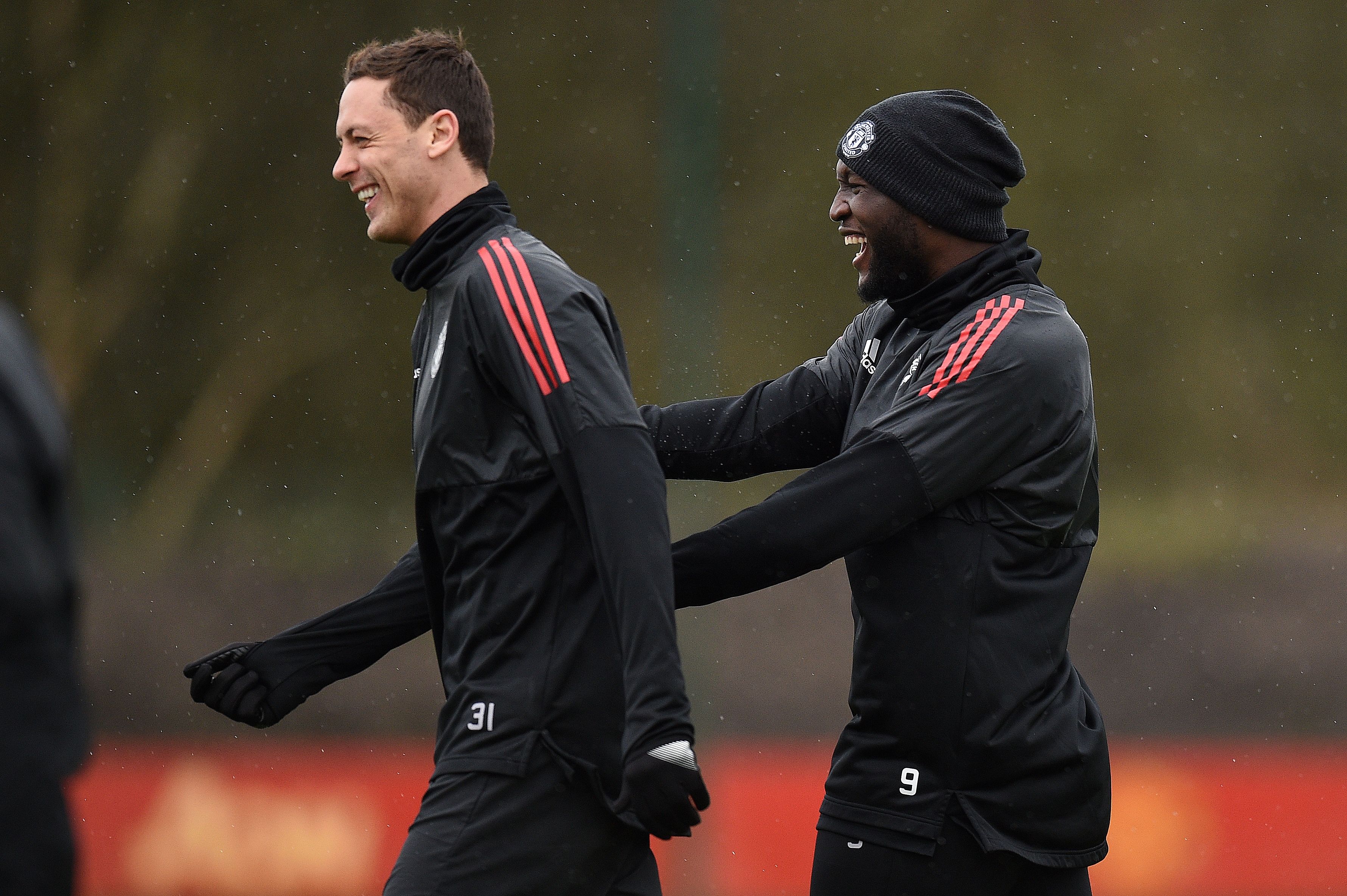 Manchester United's Serbian midfielder Nemanja Matic (L) and Manchester United's Belgian striker Romelu Lukaku attend a team training session at the club's training complex near Carrington, west of Manchester in north west England on March 12, 2018, on the eve of their UEFA Champions League round of 16 second-leg football match against Sevilla. / AFP PHOTO / Oli SCARFF        (Photo credit should read OLI SCARFF/AFP/Getty Images)