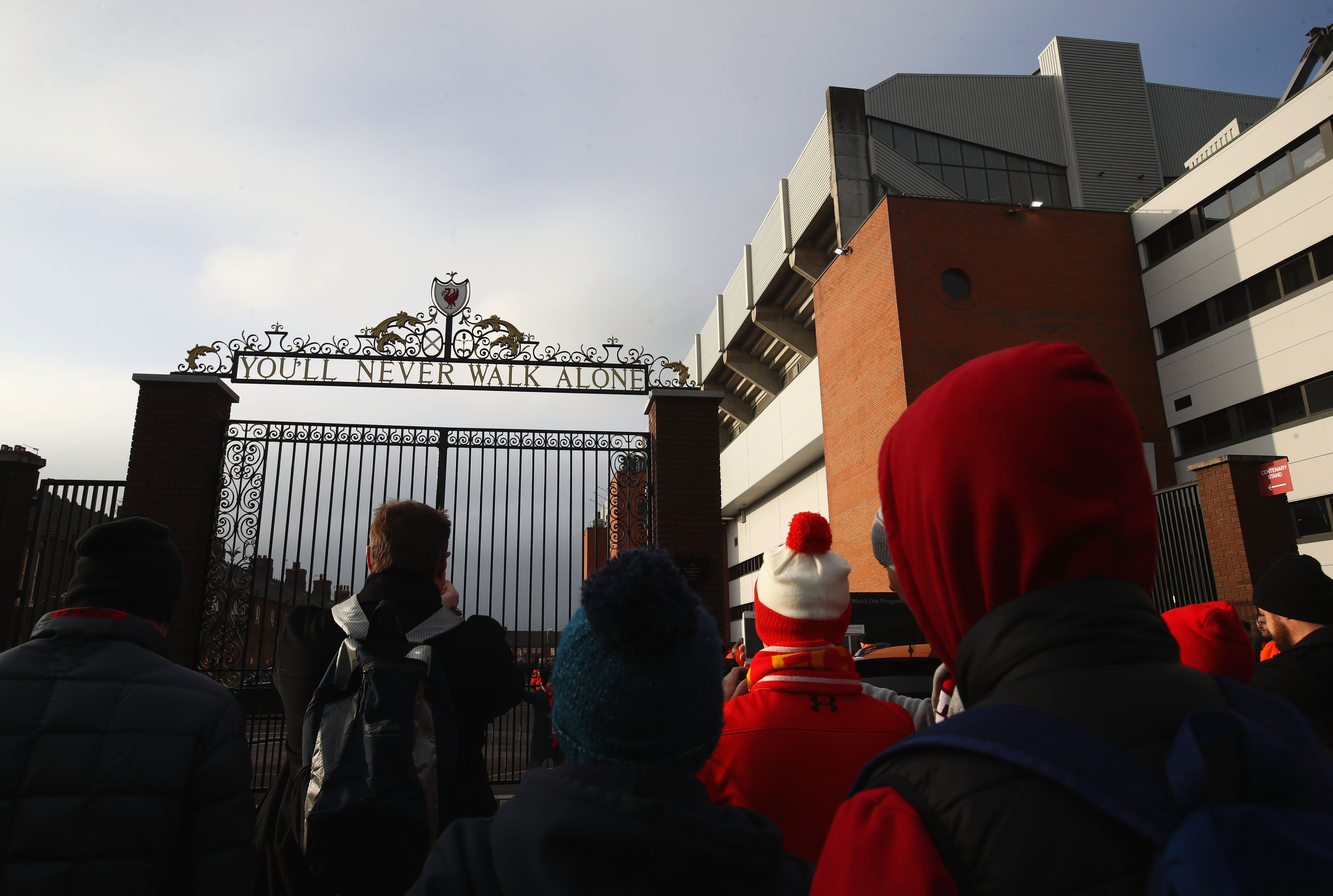 LIVERPOOL, ENGLAND - JANUARY 21: Fans wait outside the stadium prior to the Premier League match between Liverpool and Swansea City at Anfield on January 21, 2017 in Liverpool, England.  (Photo by Julian Finney/Getty Images)