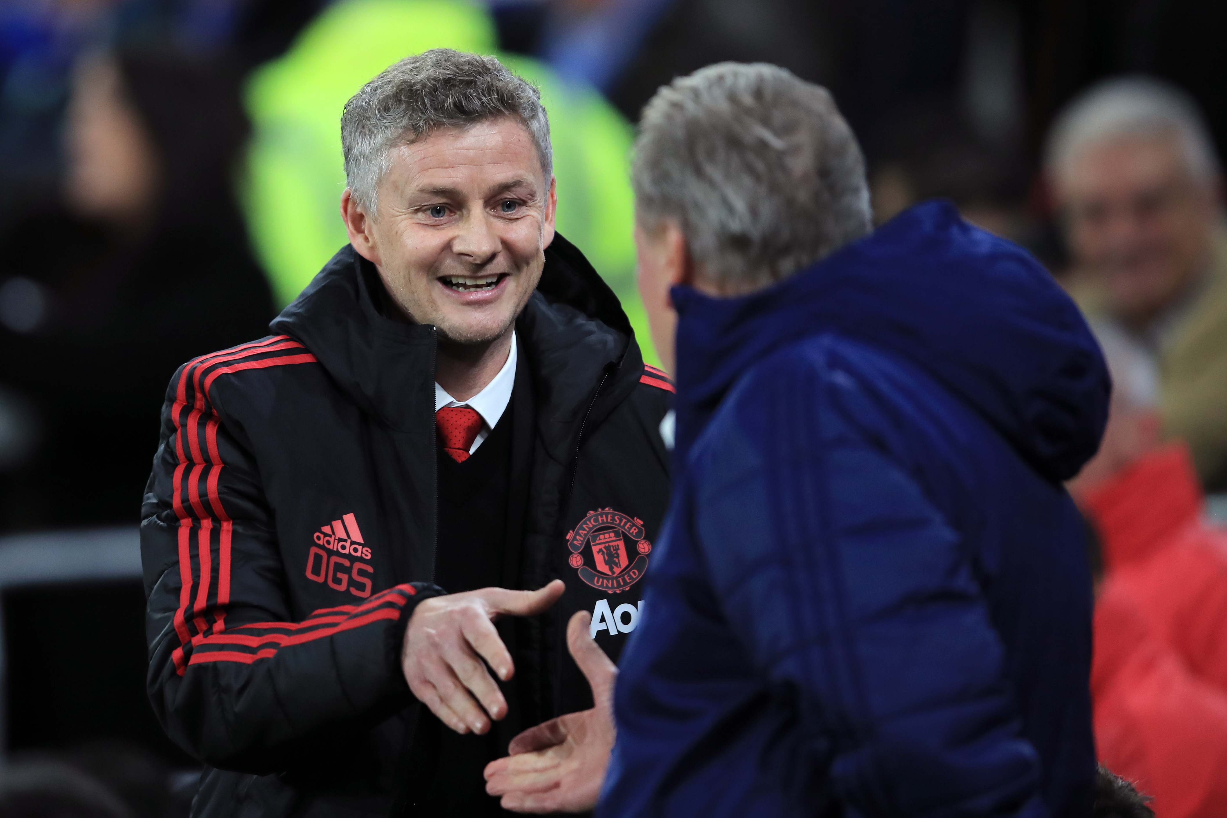 CARDIFF, WALES - DECEMBER 22:  Ole Gunnar Solskjaer, Interim Manager of Manchester United greets Neil Warnock, Manager of Cardiff City prior to the Premier League match between Cardiff City and Manchester United at Cardiff City Stadium on December 22, 2018 in Cardiff, United Kingdom.  (Photo by Marc Atkins/Getty Images)