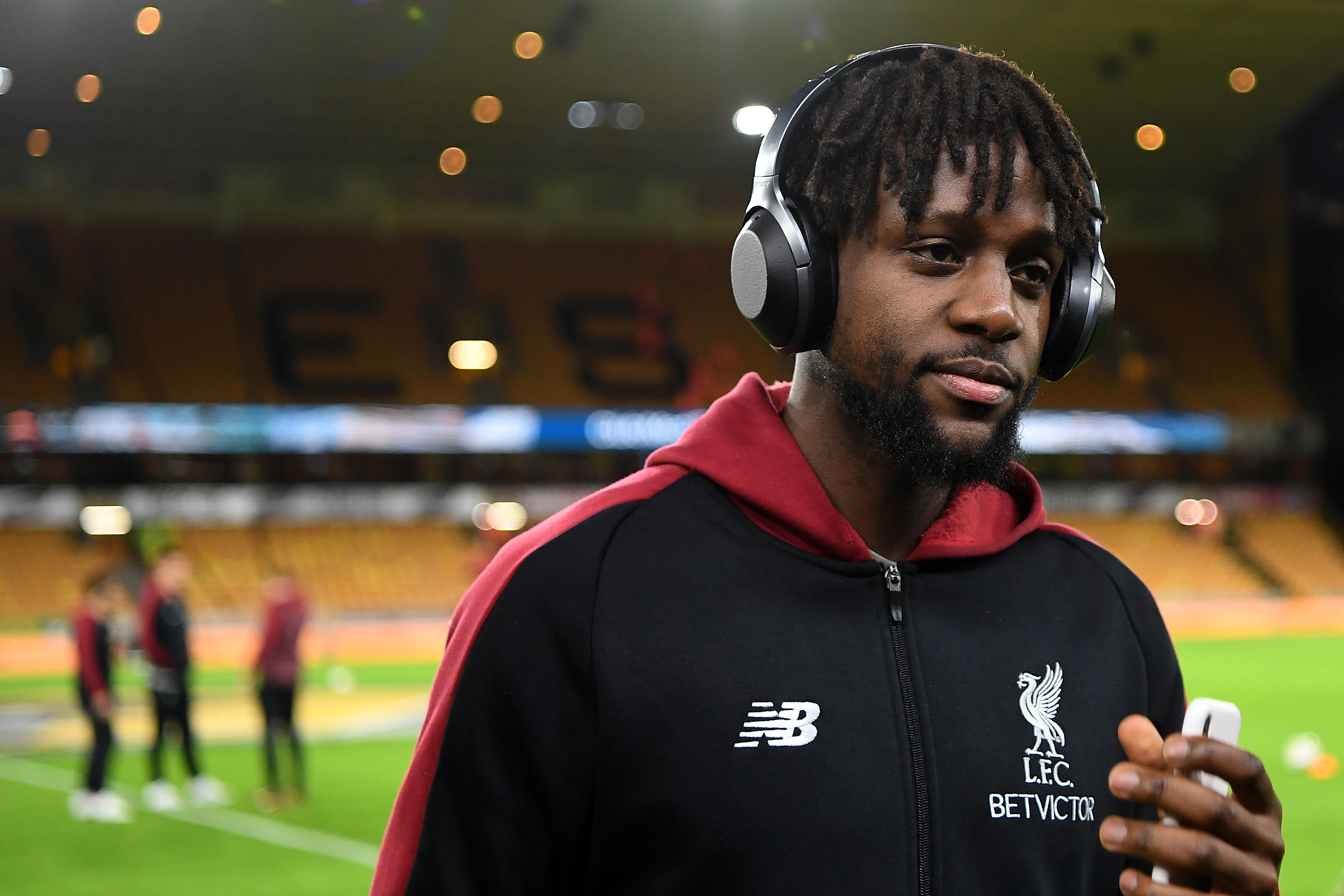 WOLVERHAMPTON, ENGLAND - JANUARY 07:  Divock Origi of Liverpool inspects the pitch prior to the Emirates FA Cup Third Round match between Wolverhampton Wanderers and Liverpool at Molineux on January 7, 2019 in Wolverhampton, United Kingdom.  (Photo by Michael Regan/Getty Images)