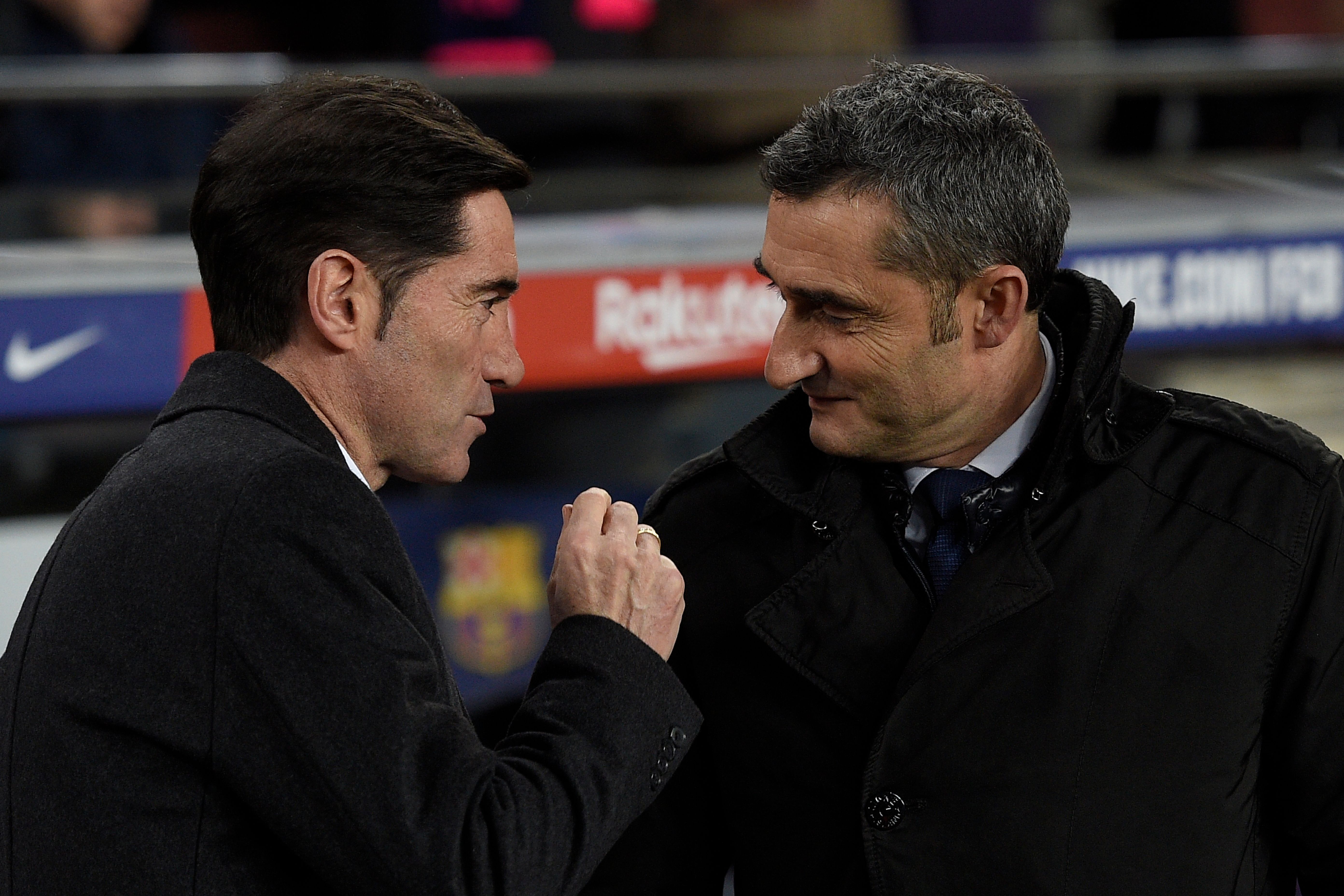 Valencia's Spanish coach Marcelino Garcia Toral (L) speaks with Barcelona's Spanish coach Ernesto Valverde before the Spanish league football match FC Barcelona against Valencia CF at the Camp Nou stadium in Barcelona on February 2, 2019. (Photo by LLUIS GENE / AFP)        (Photo credit should read LLUIS GENE/AFP/Getty Images)