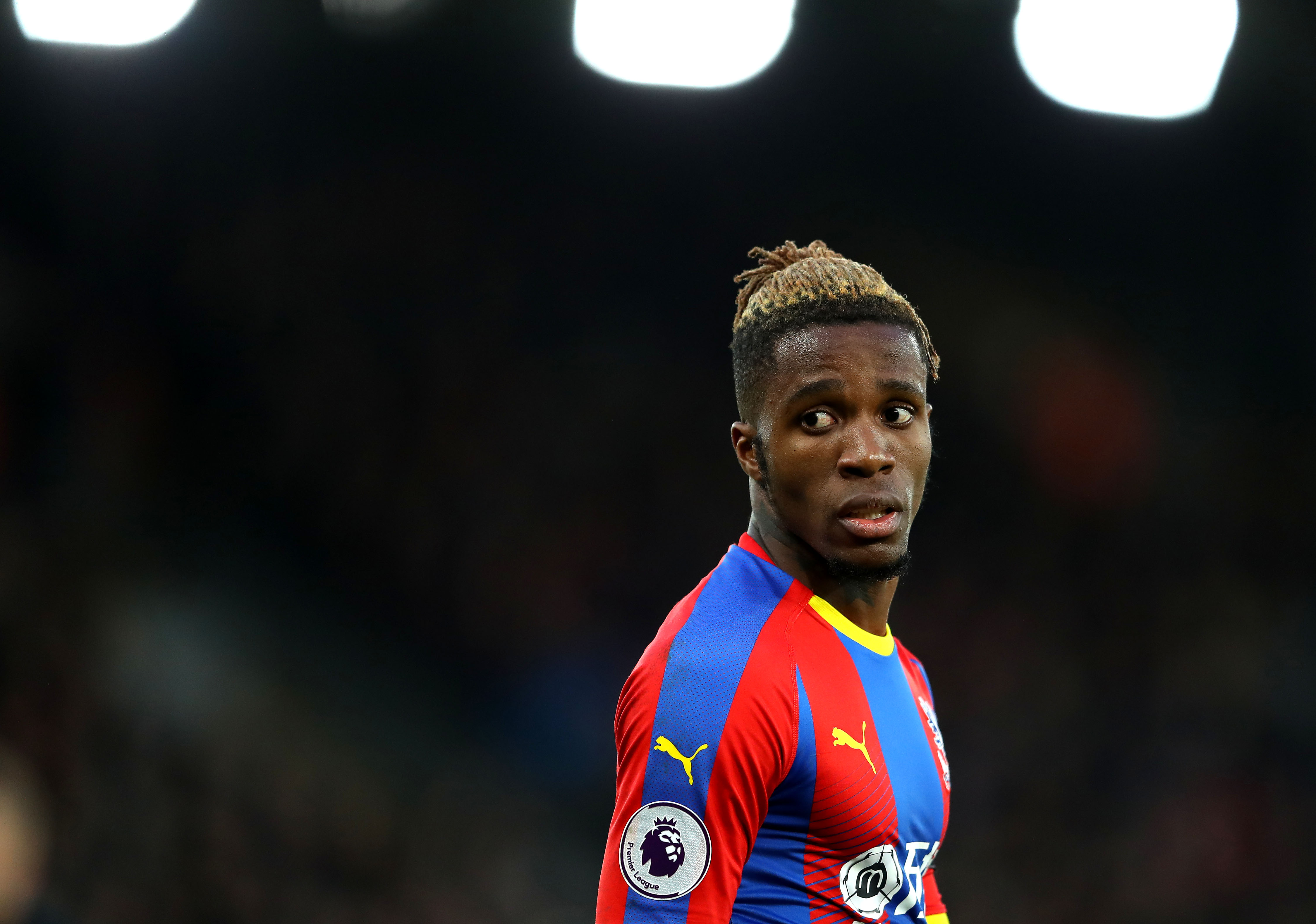 Wilfried Zaha is linked with move to Arsenal. (Photo courtesy: AFP/Getty)