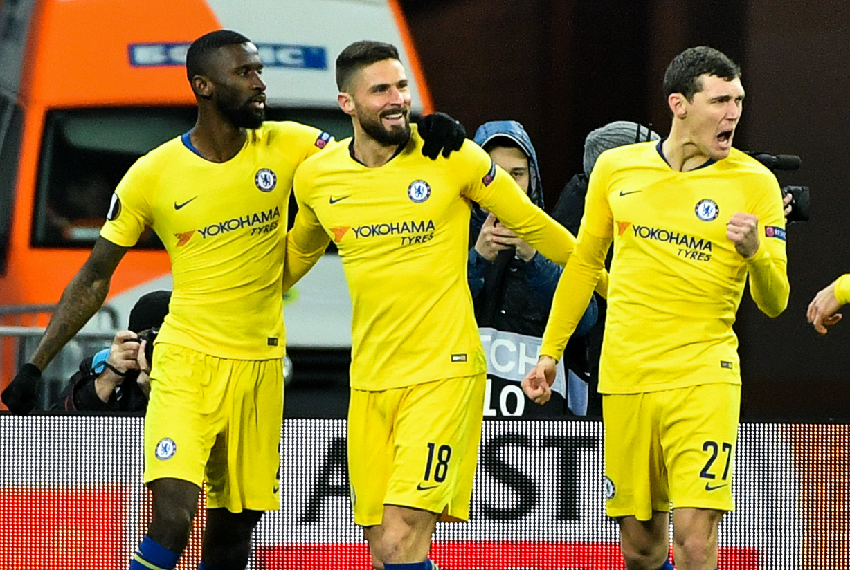 (From L) Chelsea's German defender Antonio Ruediger, Chelsea's French forward Olivier Giroud and Chelsea's Danish defender Andreas Christensen celebrate after scoring a goal during the UEFA Europa League round of 16, second leg football match between FC Dynamo Kyiv and Chelsea FC at NSK Olimpiyskyi stadium in Kiev on March 14, 2019. (Photo by Sergei SUPINSKY / AFP)        (Photo credit should read SERGEI SUPINSKY/AFP/Getty Images)