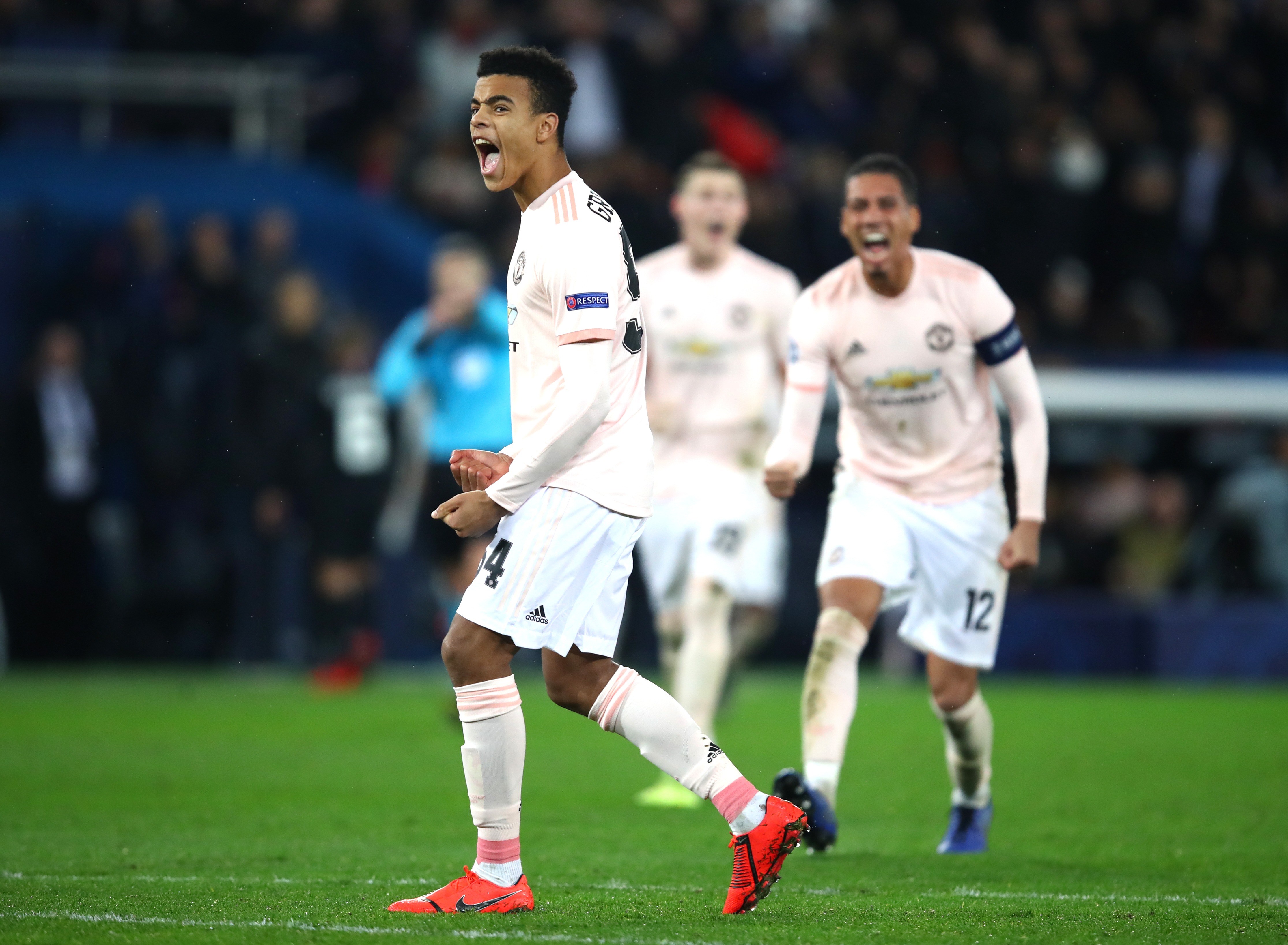 PARIS, FRANCE - MARCH 06:  Mason Greenwood of Manchester United celebrates the awarding of the penalty during the UEFA Champions League Round of 16 Second Leg match between Paris Saint-Germain and Manchester United at Parc des Princes on March 06, 2019 in Paris, . (Photo by Julian Finney/Getty Images)