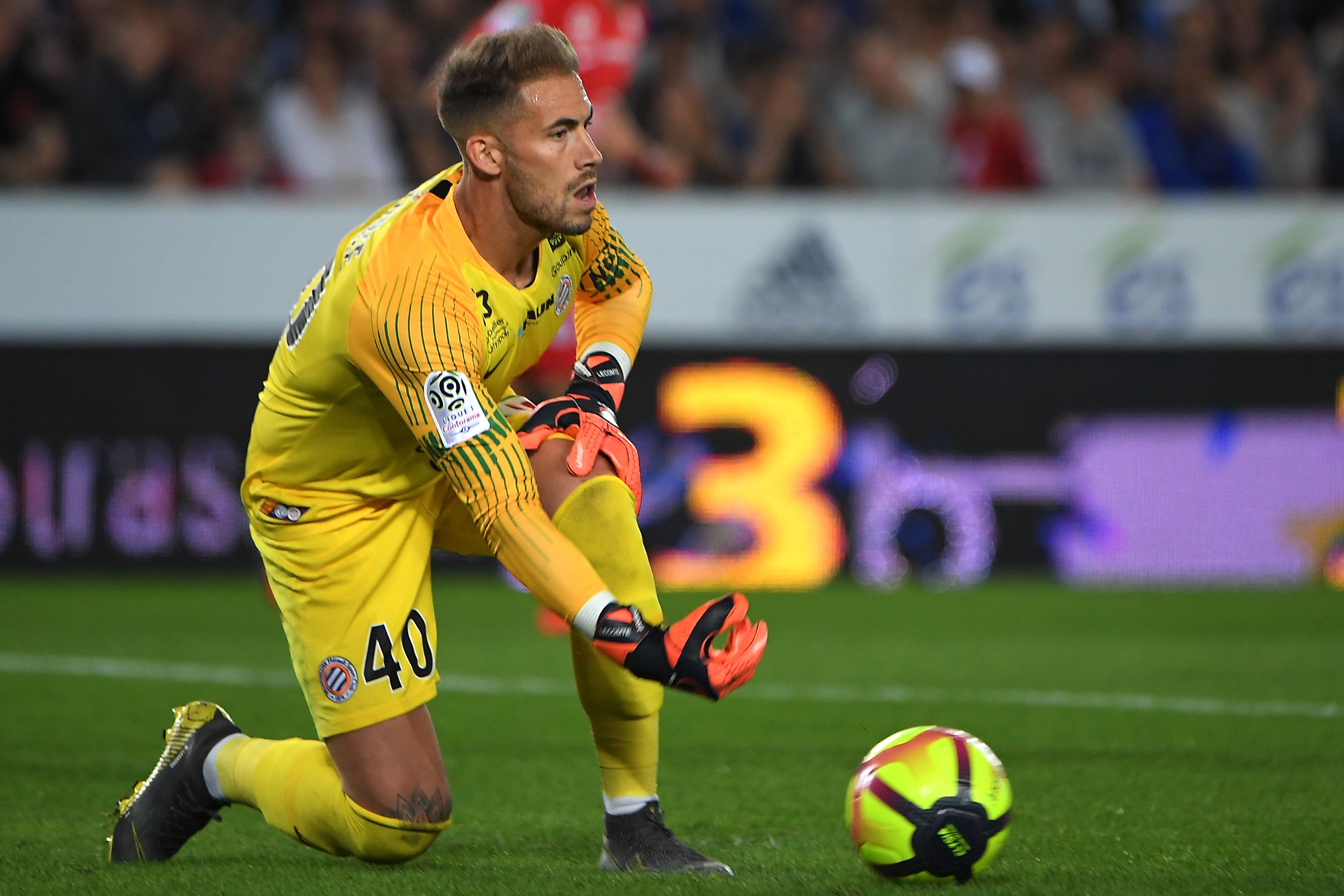 Montpellier's French goalkeeper Benjamin Lecomte controls the ball during the French L1 football match between Strasbourg and Montpellier, on April 20, 2019 at the Meinau stadium in Strasbourg, eastern France. (Photo by PATRICK HERTZOG / AFP)        (Photo credit should read PATRICK HERTZOG/AFP/Getty Images)