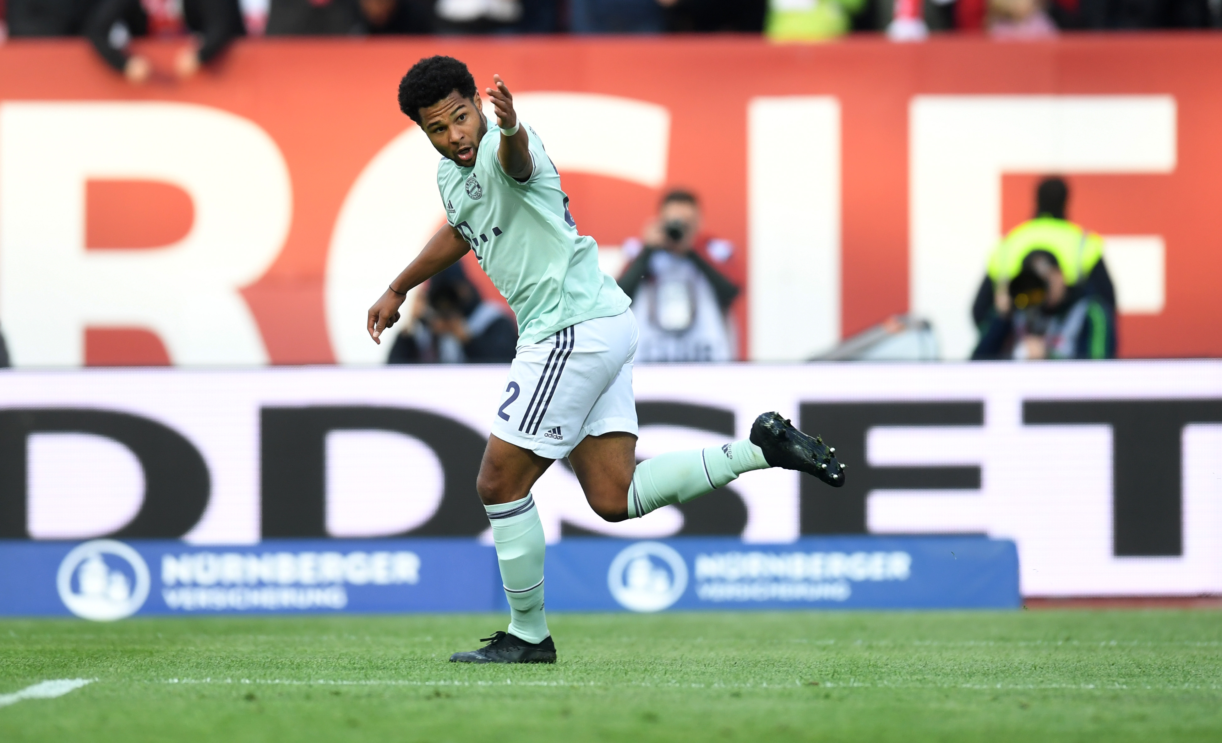 Bayern Munich's German midfielder Serge Gnabry celebrate scoring during the German first division Bundesliga football match Nuremberg v FC Bayern Munich on April 28, 2019 in Nuremberg, southern Germany. (Photo by Christof STACHE / AFP) / RESTRICTIONS: DFL REGULATIONS PROHIBIT ANY USE OF PHOTOGRAPHS AS IMAGE SEQUENCES AND/OR QUASI-VIDEO        (Photo credit should read CHRISTOF STACHE/AFP/Getty Images)