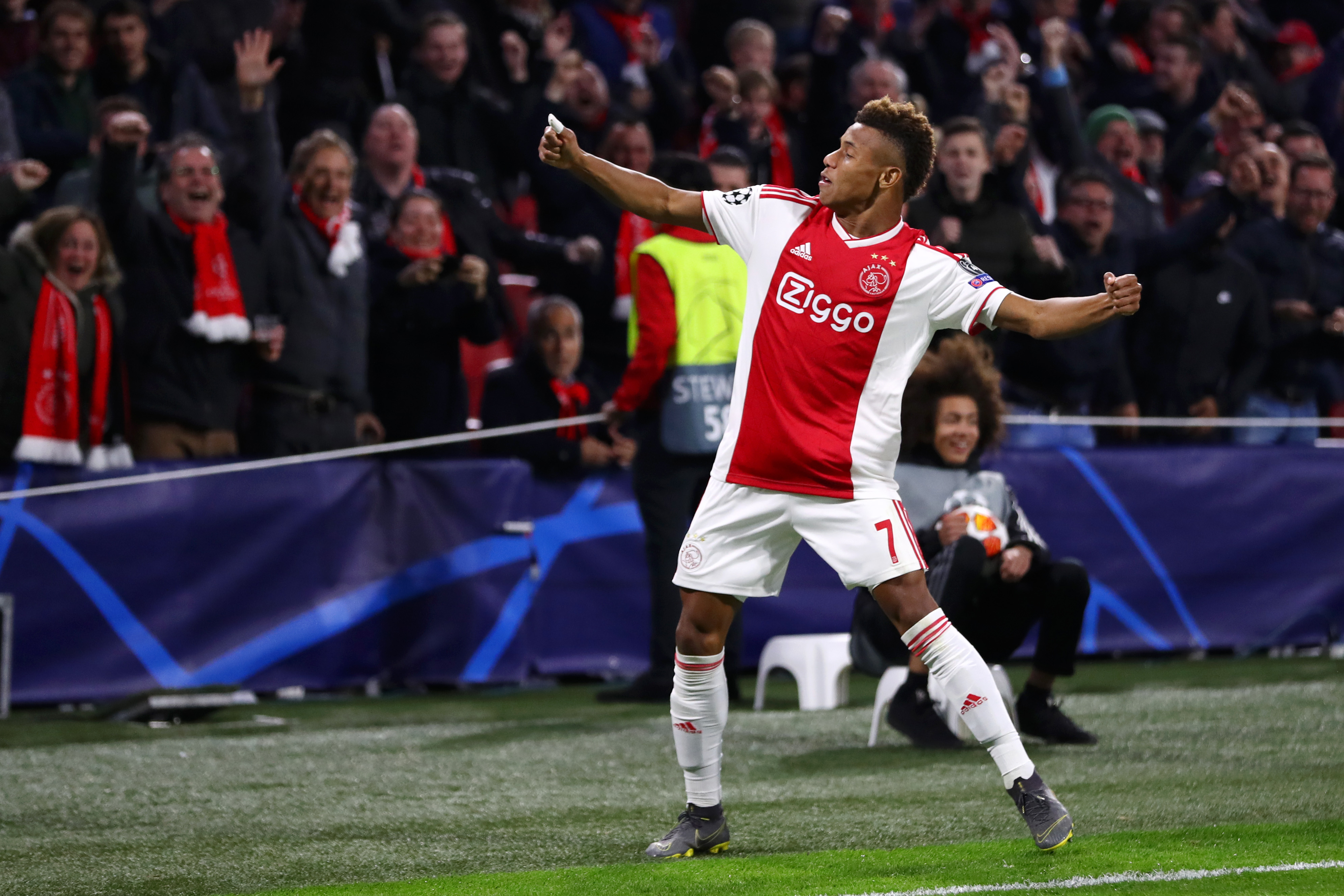 AMSTERDAM, NETHERLANDS - APRIL 10:  David Neres of Ajax celebrates after scoring his team's first goal during the UEFA Champions League Quarter Final first leg match between Ajax and Juventus at Johan Cruyff Arena on April 10, 2019 in Amsterdam, Netherlands. (Photo by Michael Steele/Getty Images)