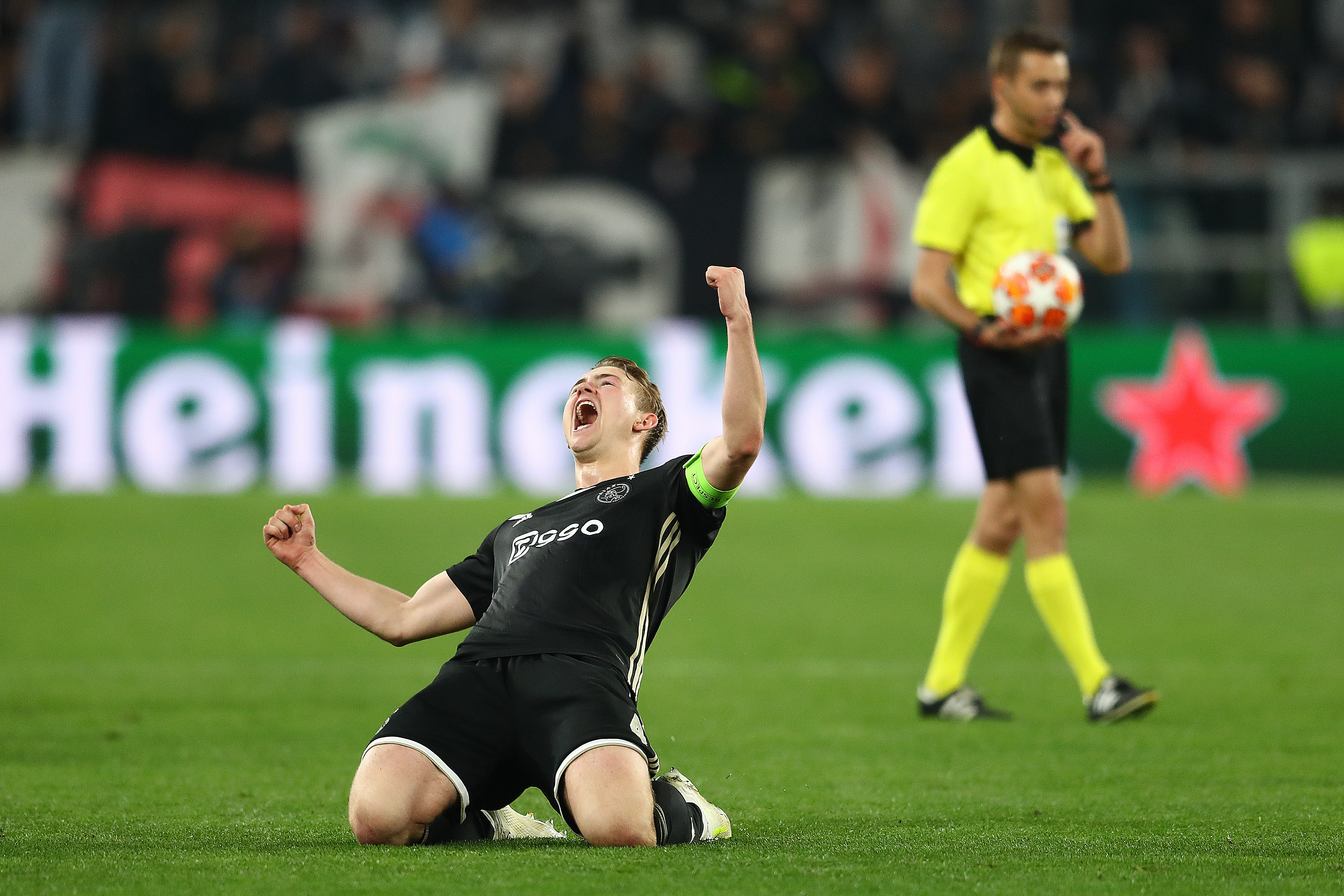 TURIN, ITALY - APRIL 16:  Matthijs de Ligt of Ajax celebrates his sides 2-1 victory as referee Clement Turpin of France blows the final whistle during the UEFA Champions League Quarter Final second leg match between Juventus and Ajax at Juventus Stadium on April 16, 2019 in Turin, Italy. (Photo by Michael Steele/Getty Images)