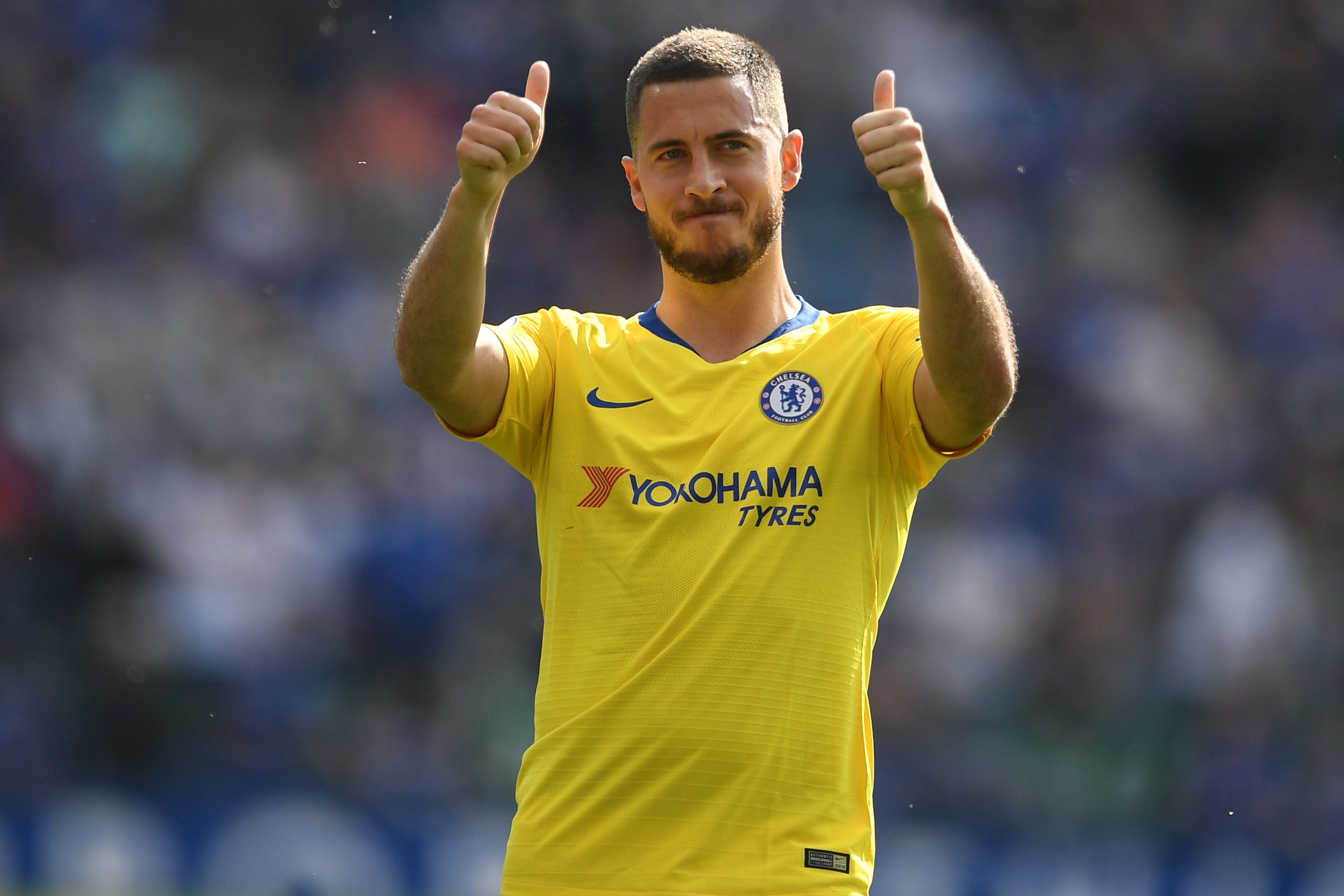 Chelsea's Belgian midfielder Eden Hazard gestures to supporters on the pitch after the English Premier League football match between Leicester City and Chelsea at King Power Stadium in Leicester, central England on May 12, 2019. - The game finished 0-0. (Photo by Daniel LEAL-OLIVAS / AFP) / RESTRICTED TO EDITORIAL USE. No use with unauthorized audio, video, data, fixture lists, club/league logos or 'live' services. Online in-match use limited to 120 images. An additional 40 images may be used in extra time. No video emulation. Social media in-match use limited to 120 images. An additional 40 images may be used in extra time. No use in betting publications, games or single club/league/player publications. /         (Photo credit should read DANIEL LEAL-OLIVAS/AFP/Getty Images)