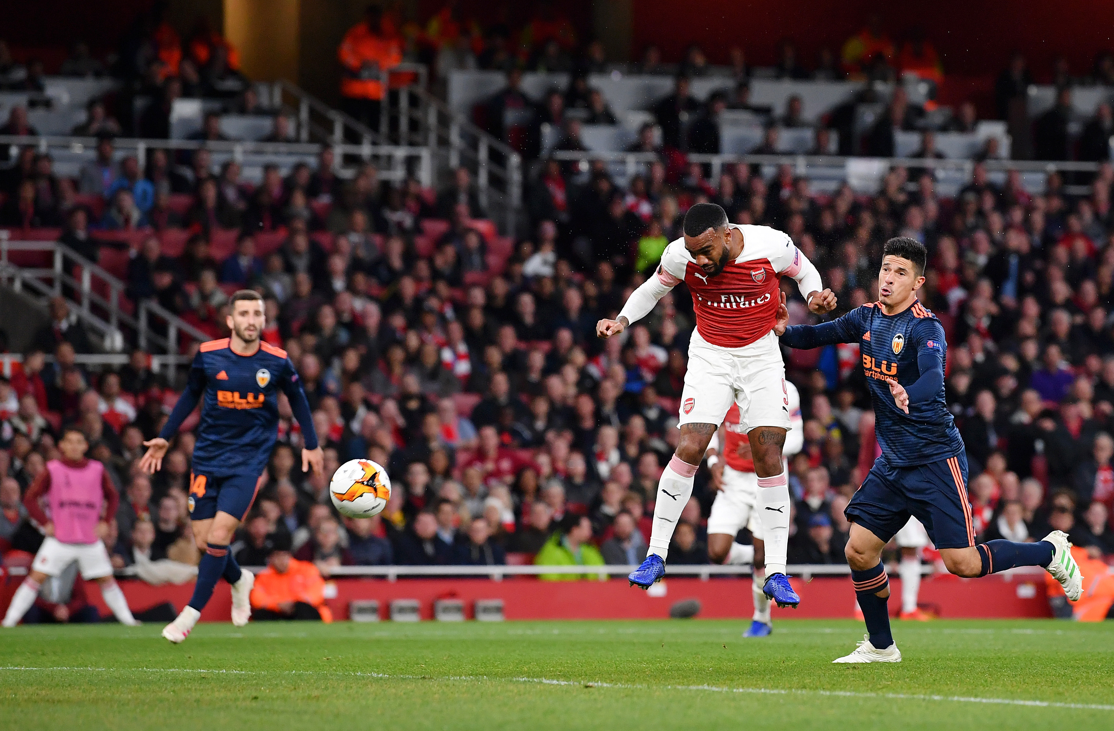 LONDON, ENGLAND - MAY 02:  Alexandre Lacazette of Arsenal scores his team's second goal during the UEFA Europa League Semi Final First Leg match between Arsenal and Valencia at Emirates Stadium on May 02, 2019 in London, England. (Photo by Justin Setterfield/Getty Images)