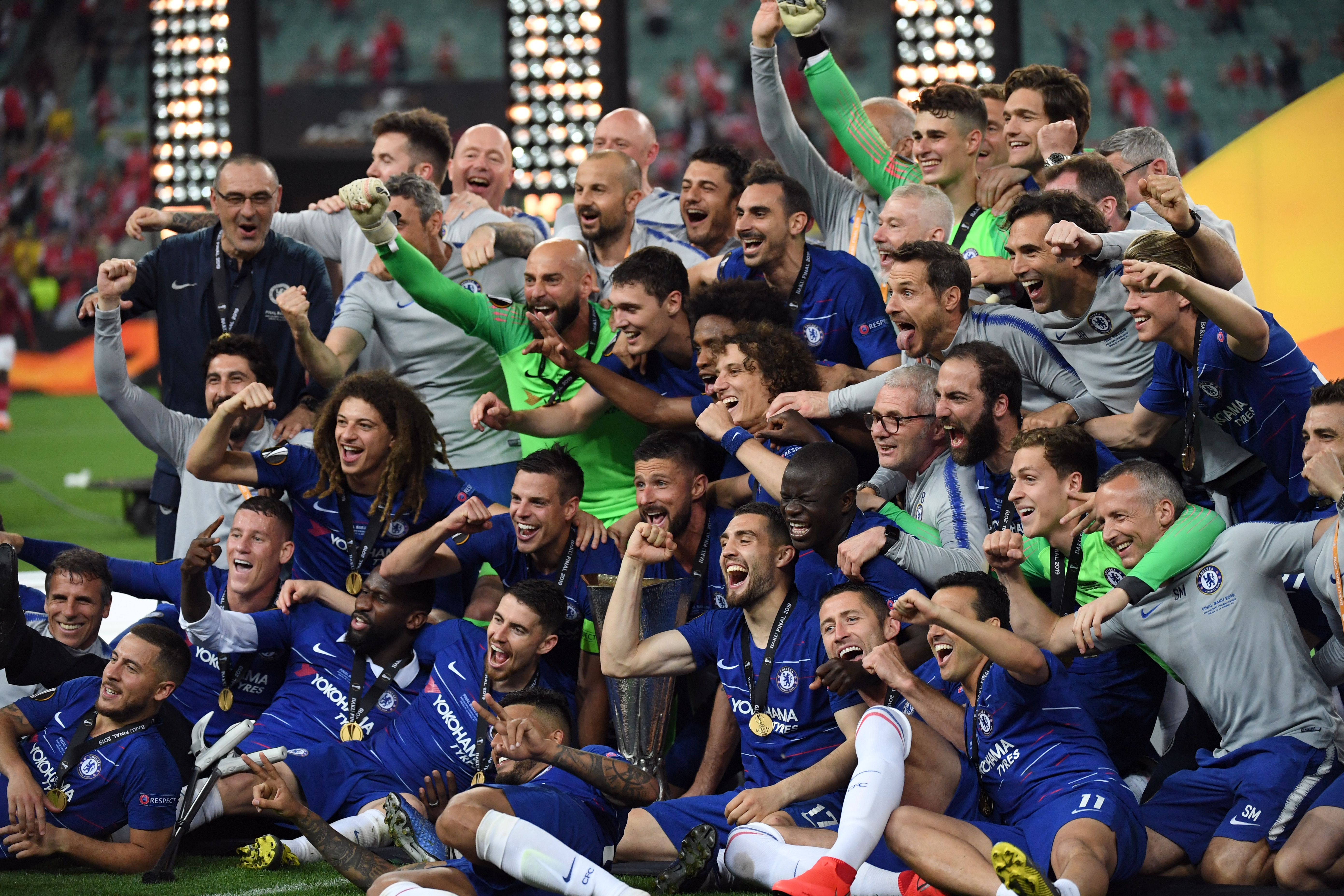 Chelsea's players celebrate with the trophy after winning the UEFA Europa League final football match between Chelsea FC and Arsenal FC at the Baku Olympic Stadium in Baku, Azerbaijian, on May 29, 2019. (Photo by OZAN KOSE / AFP)        (Photo credit should read OZAN KOSE/AFP/Getty Images)