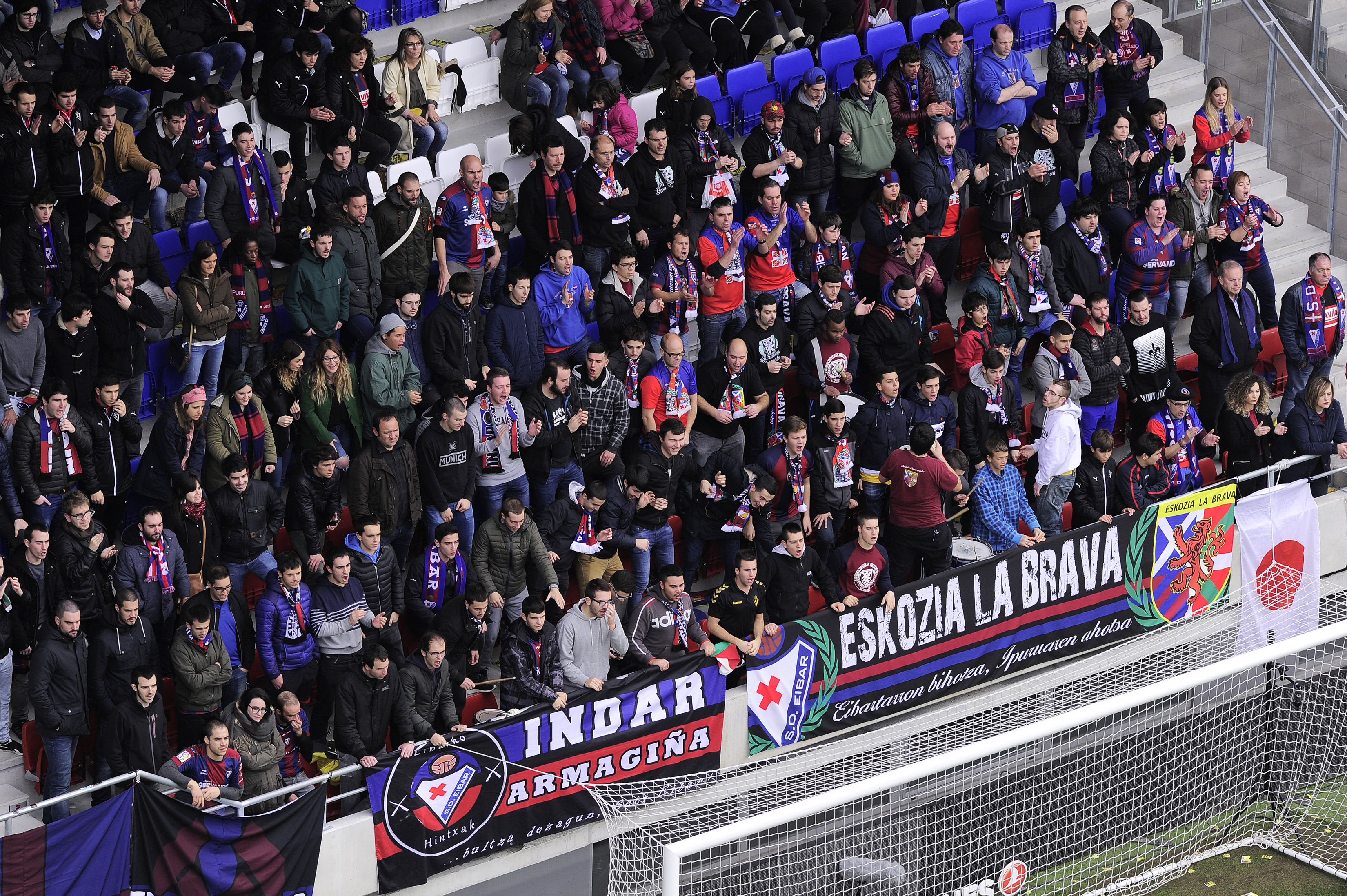 SD Eibar supporters group "Eskozia La Brava" members attend the Spanish league football match SD Eibar vs Deportivo Alaves at the Ipurua stadium in Eibar on December 11, 2016. 
With a stadium of just 6,200 seats surrounded by real estate, a  team that is only five points away from Atletico Madrid's "Cholo" Simeone: welcome to Eibar, a small town in the Basque Country (northern Spain), which boasts that "another football is possible". / AFP / ANDER GILLENEA / TO GO WITH A STORY BY MATHIEU GORSE        (Photo credit should read ANDER GILLENEA/AFP/Getty Images)