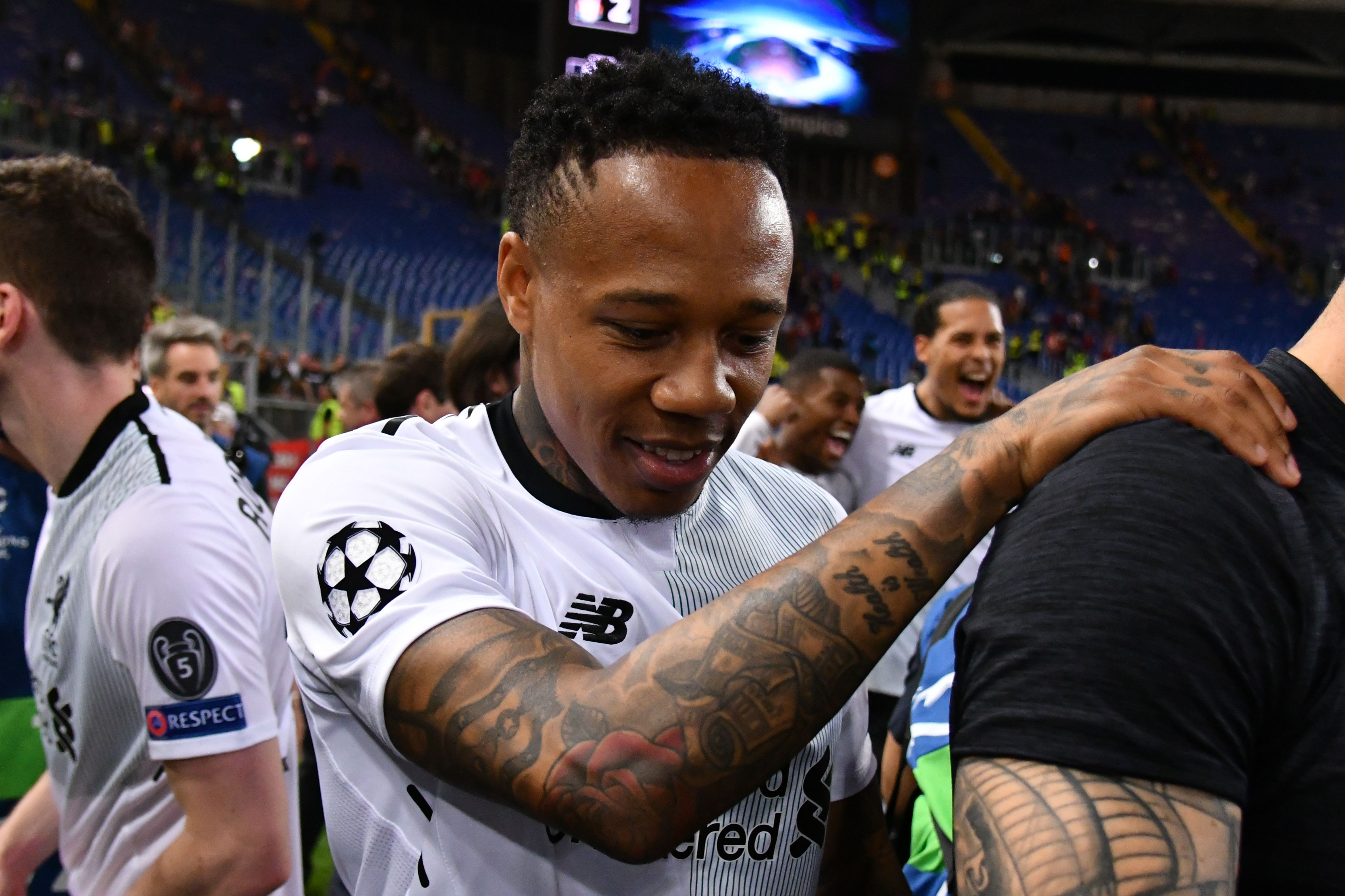 Liverpool's English defender Nathaniel Clyne celebrates their victory at the end of the UEFA Champions League semi-final second leg football match AS Roma vs Liverpool FC at the Stadio Olimpico in Rome on May 2, 2018. (Photo by Alberto PIZZOLI / AFP)        (Photo credit should read ALBERTO PIZZOLI/AFP/Getty Images)
