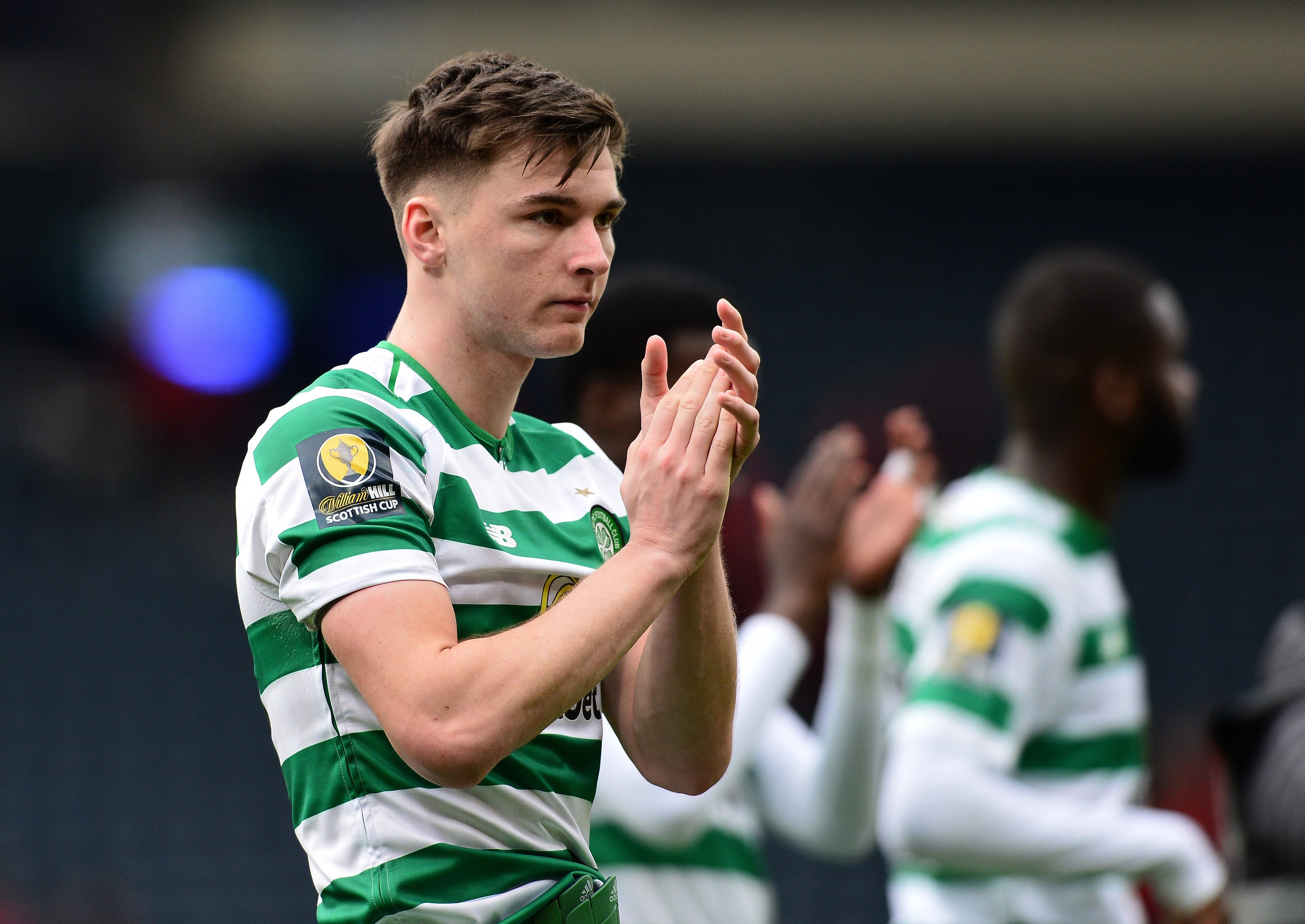 GLASGOW, SCOTLAND - APRIL 14: Kieran Tierney of Celtic applauds the fans at the final whistle during the Scottish Cup Semi Final between Aberdeen and Celtic at Hampden Park on April 14, 2019 in Glasgow, Scotland. (Photo by Mark Runnacles/Getty Images)