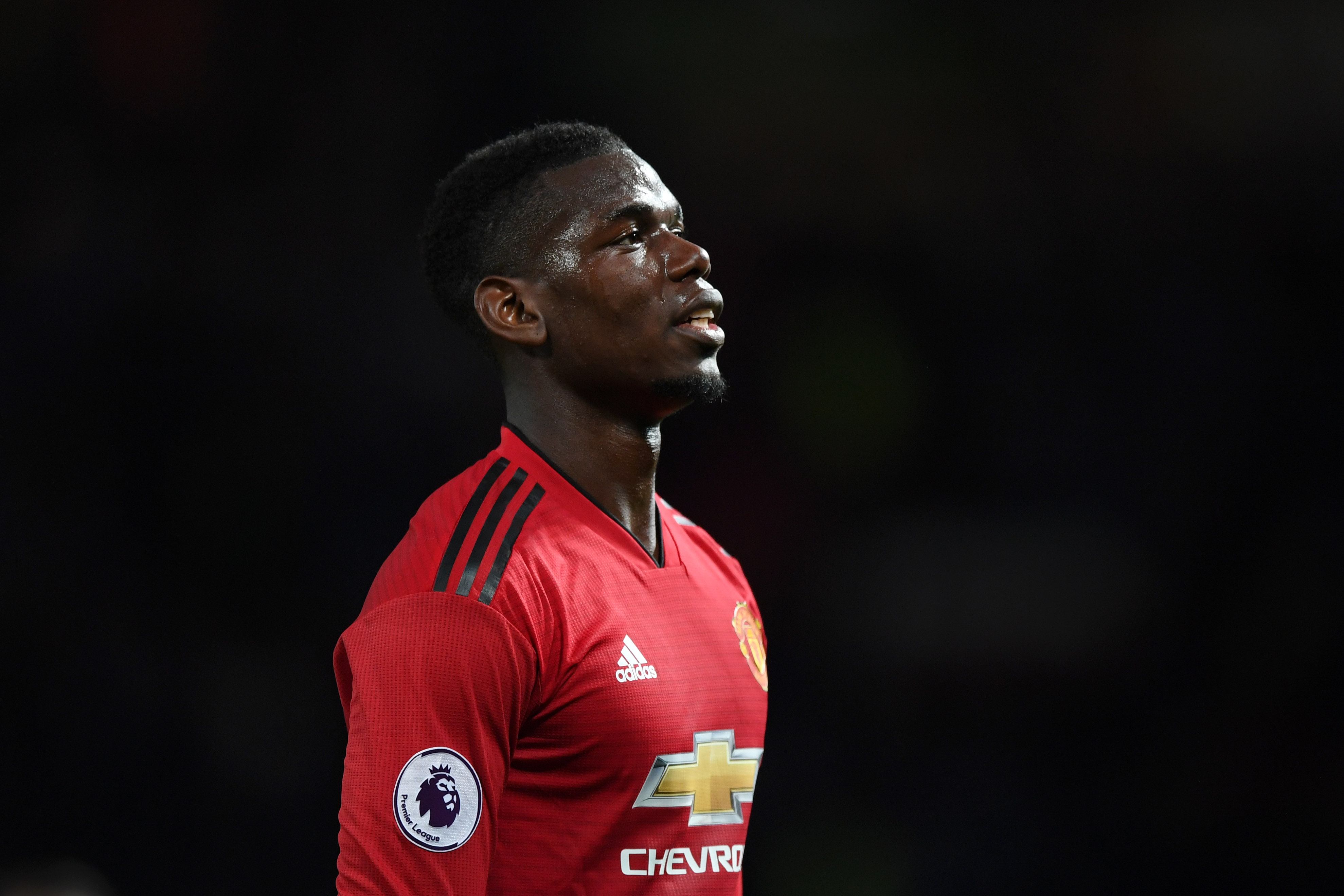 MANCHESTER, ENGLAND - APRIL 24:  Paul Pogba of Manchester United looks on during the Premier League match between Manchester United and Manchester City at Old Trafford on April 24, 2019 in Manchester, United Kingdom. (Photo by Shaun Botterill/Getty Images)