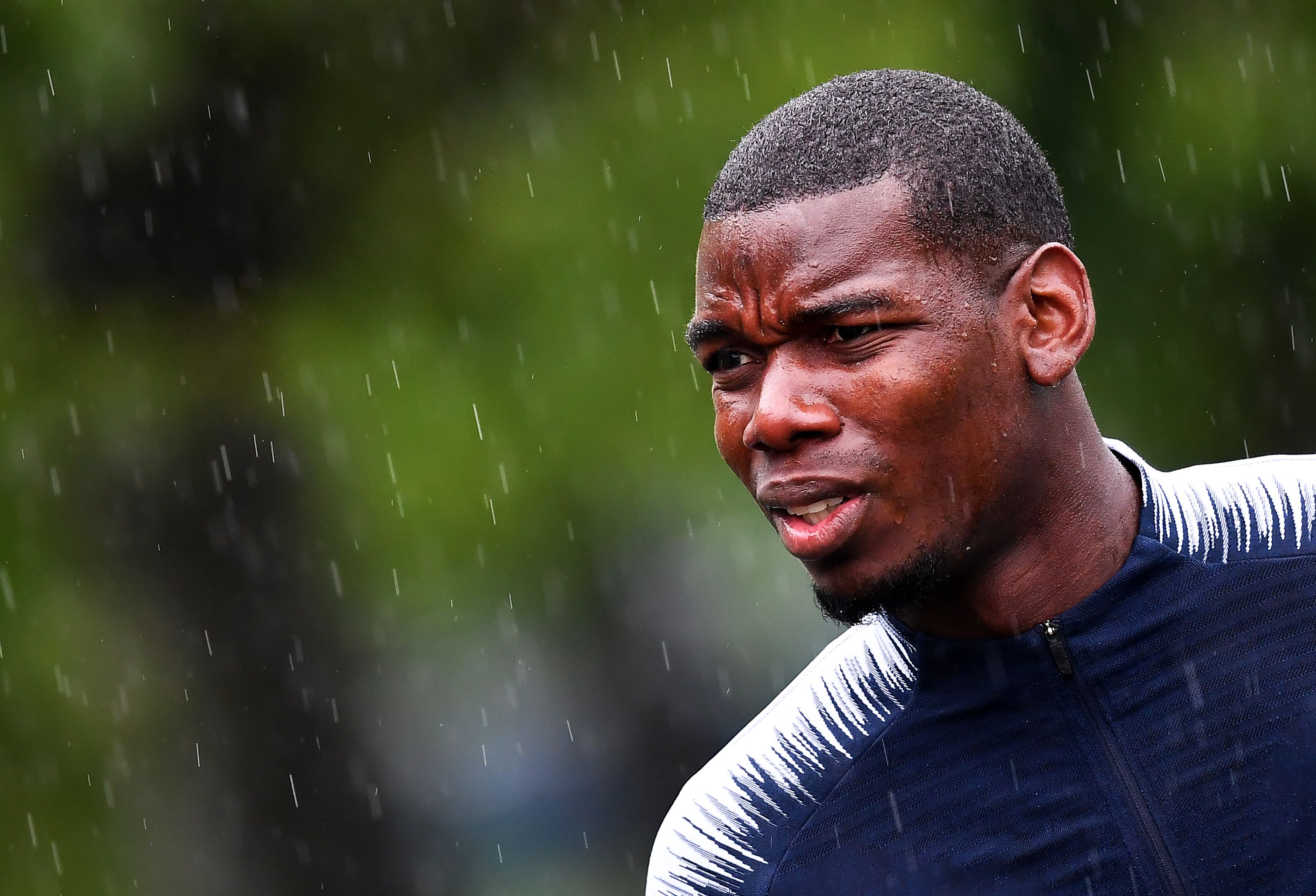 France's national football midfielder Paul Pogba arrives for a training session in Clairefontaine en Yvelines on June 5, 2019 as part of the team's preparation for the upcoming Euro 2020 qualification matches against Turkey and Andorra. (Photo by FRANCK FIFE / AFP)        (Photo credit should read FRANCK FIFE/AFP/Getty Images)