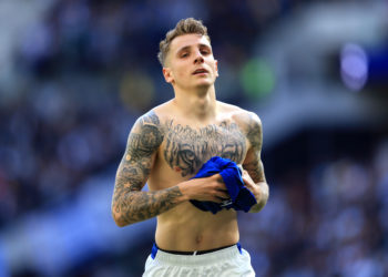 LONDON, ENGLAND - MAY 12: Lucas Digne of Everton takes his shirt to an Everton supporter after the Premier League match between Tottenham Hotspur and Everton FC at Tottenham Hotspur Stadium on May 12, 2019 in London, United Kingdom. (Photo by Stephen Pond/Getty Images)