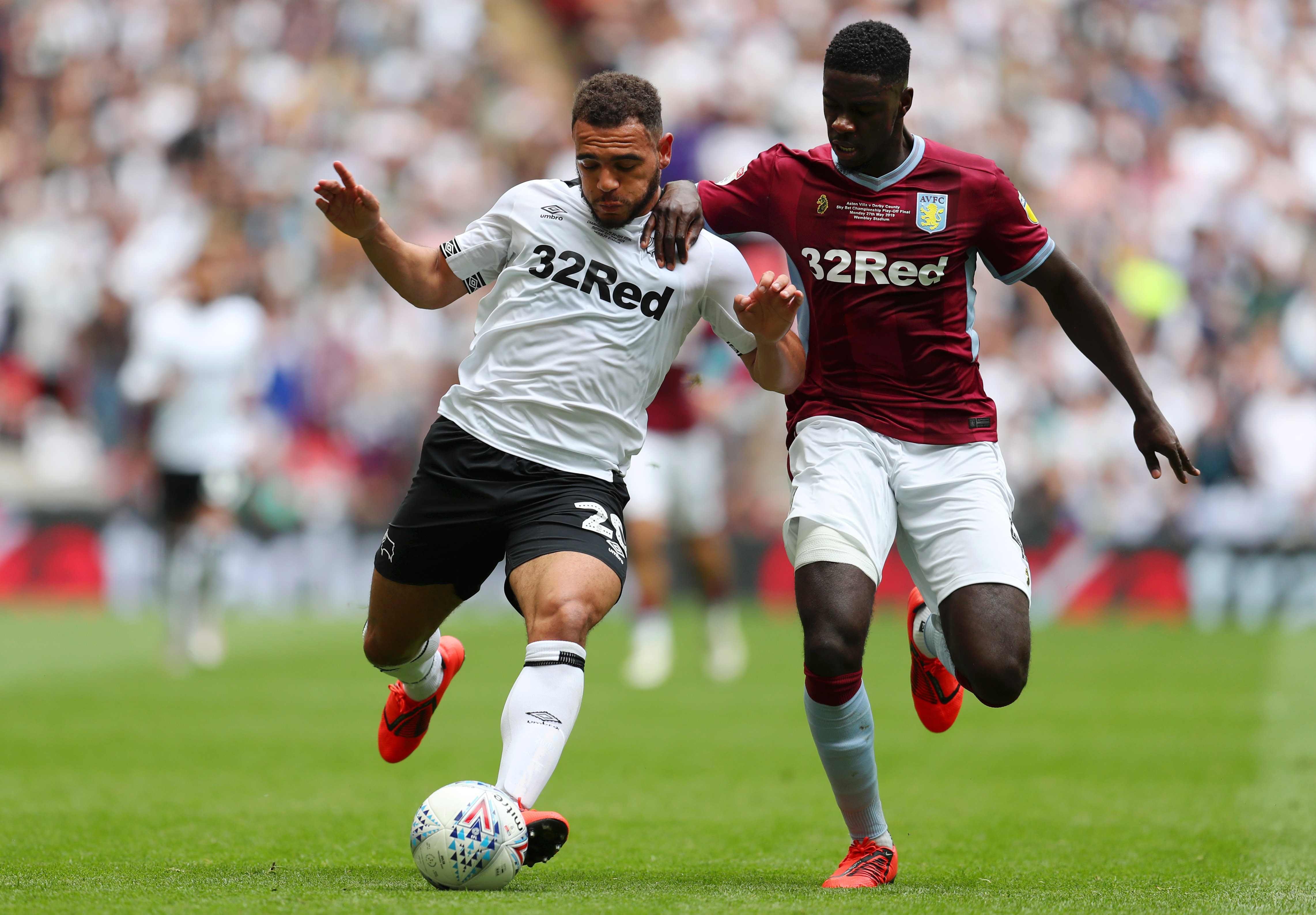 LONDON, ENGLAND - MAY 27:   Mason Bennett of Derby County battles for possession with Axel Tuanzebe of Aston Villa  during the Sky Bet Championship Play-off Final match between Aston Villa and Derby County at Wembley Stadium on May 27, 2019 in London, United Kingdom. (Photo by Catherine Ivill/Getty Images)