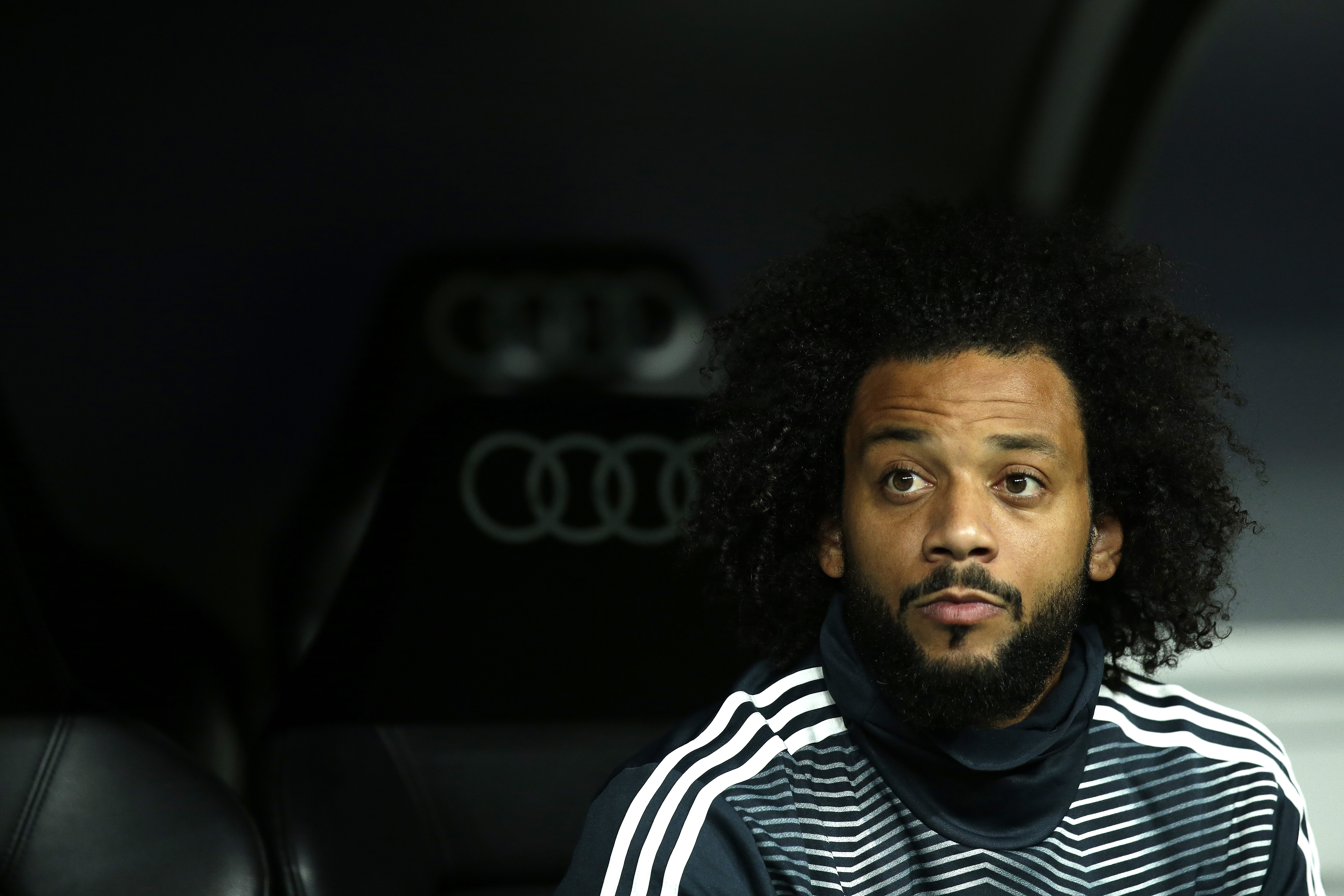 MADRID, SPAIN - MARCH 02: Marcelo of Real Madrid looks on from the bench during the La Liga match between Real Madrid CF and FC Barcelona at Estadio Santiago Bernabeu on March 02, 2019 in Madrid, Spain. (Photo by Gonzalo Arroyo Moreno/Getty Images)