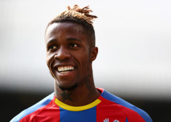 LONDON, ENGLAND - MARCH 09: Wilfried Zaha of Crystal Palace looks on during the Premier League match between Crystal Palace and Brighton & Hove Albion at Selhurst Park on March 09, 2019 in London, United Kingdom. (Photo by Dan Istitene/Getty Images)